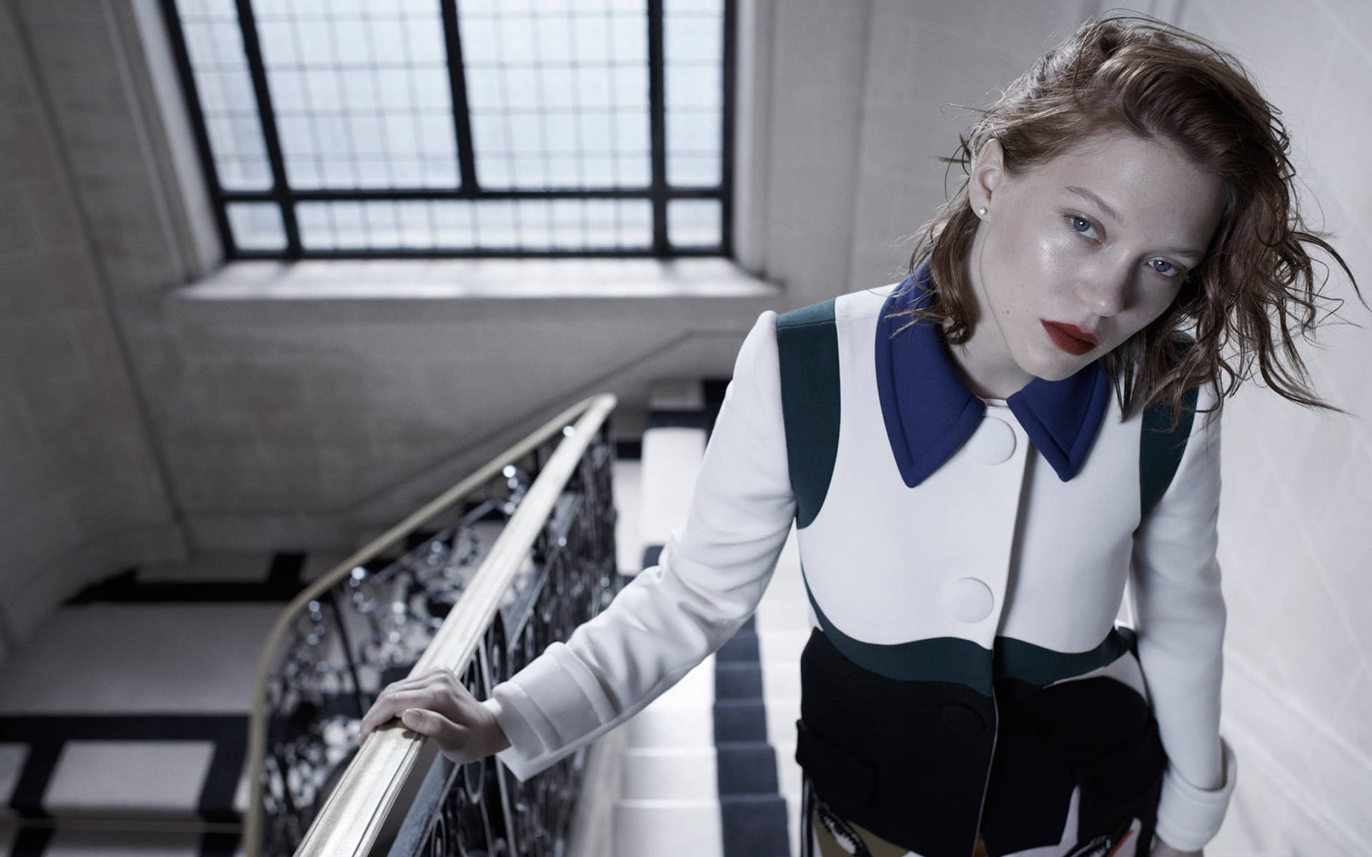 Lea Seydoux At A Staircase Background