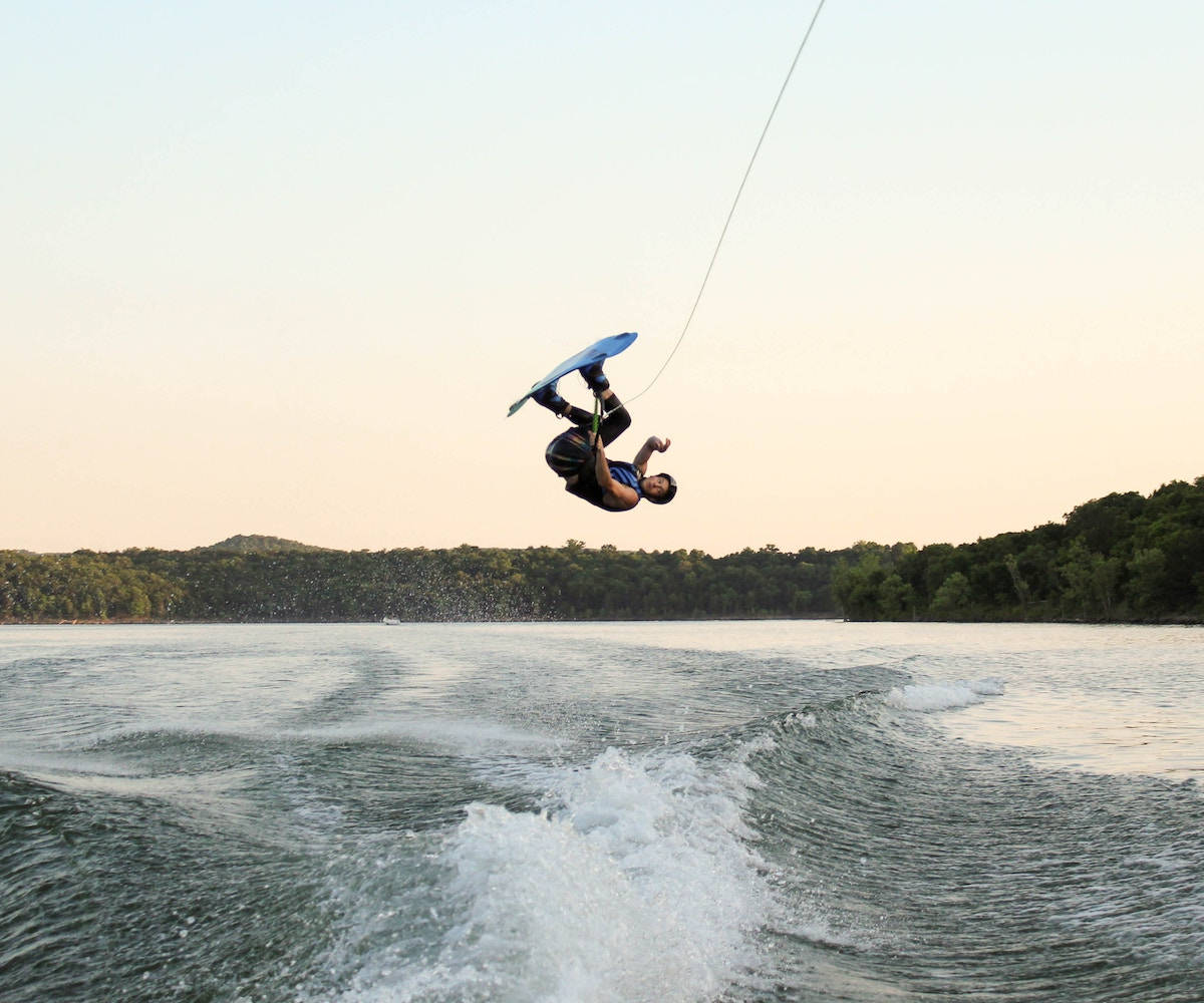 Leap Of Passion: A Wakeboarder Mid-air In Action.