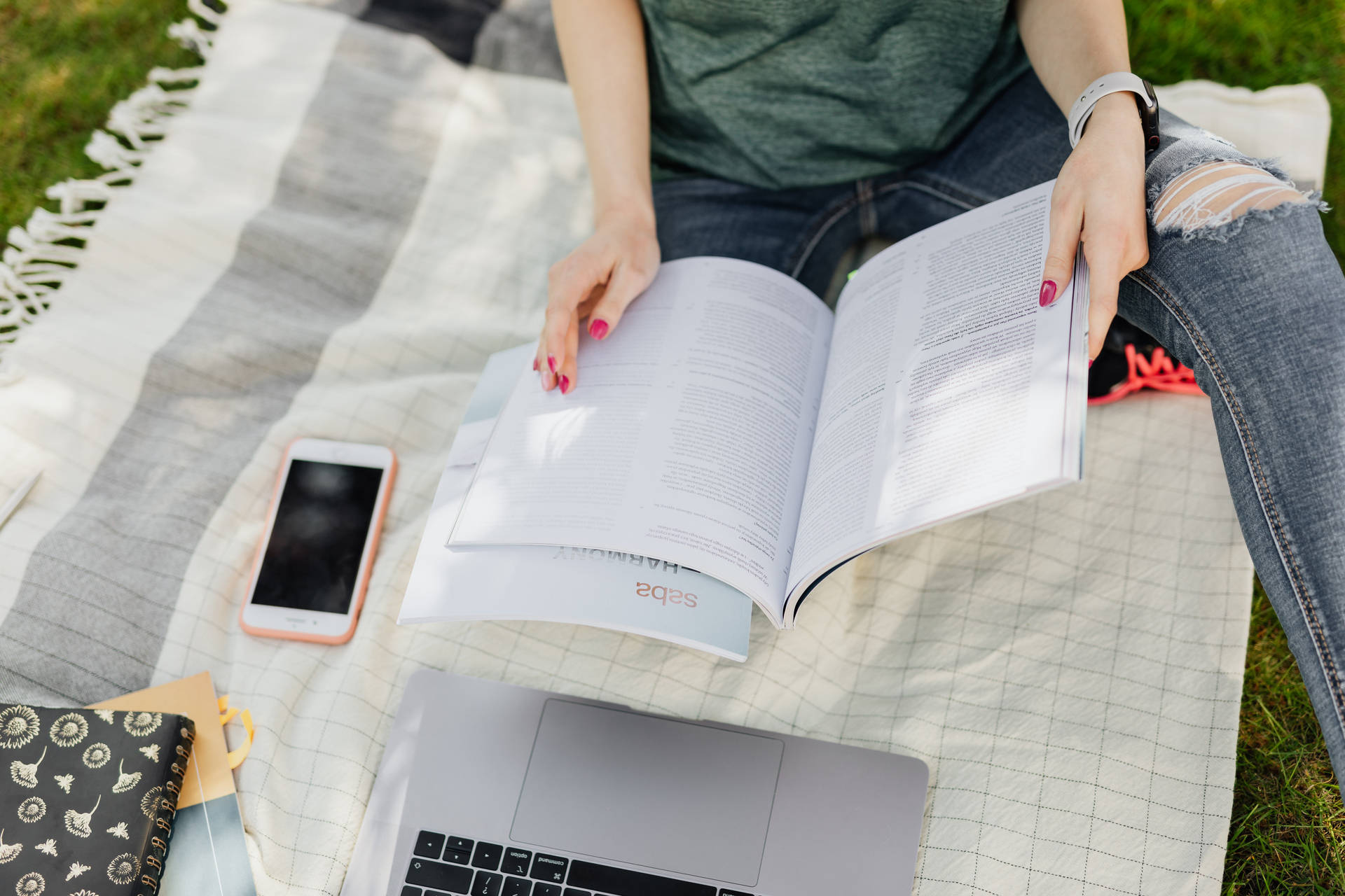 Learning And Reading On Grass Background