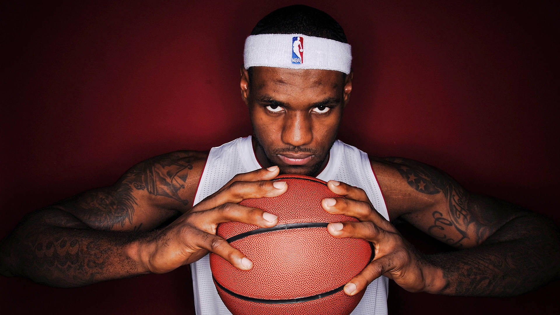 Lebron James Cool Stare With White Jersey Background