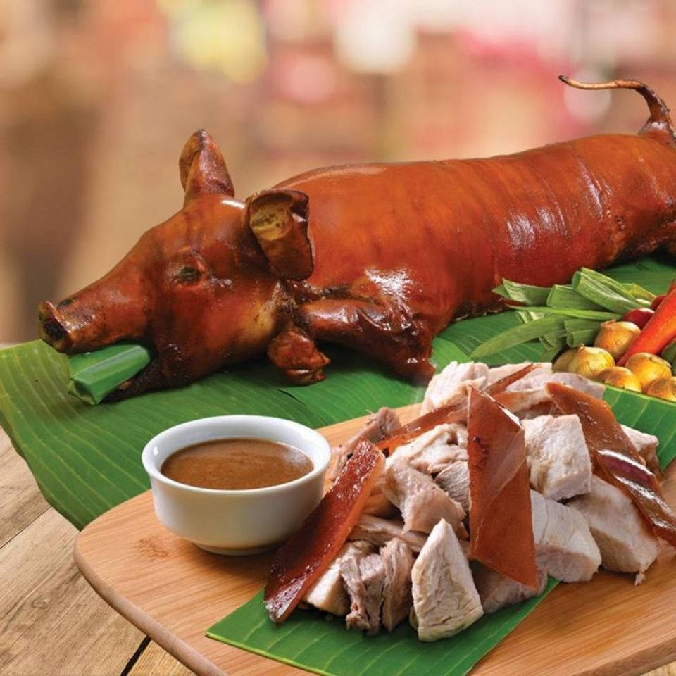 Lechon And Its Slices Background