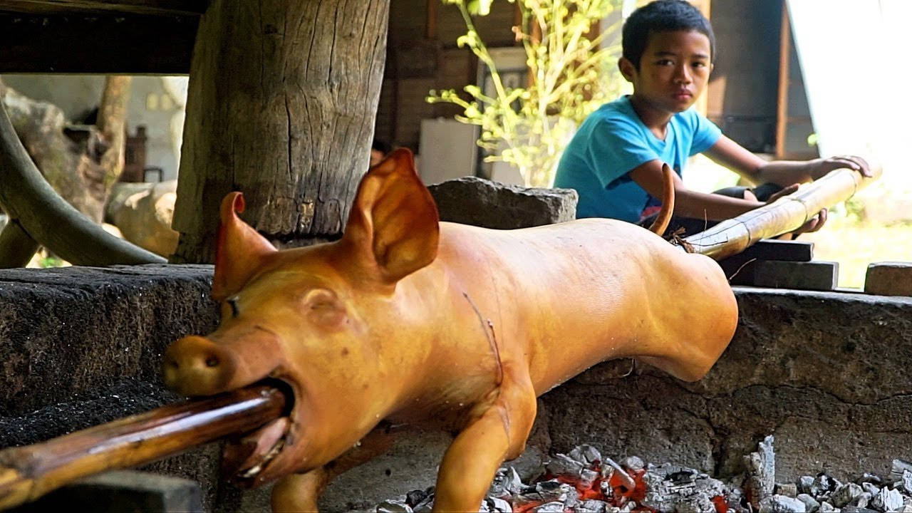 Lechon Being Rolled Background