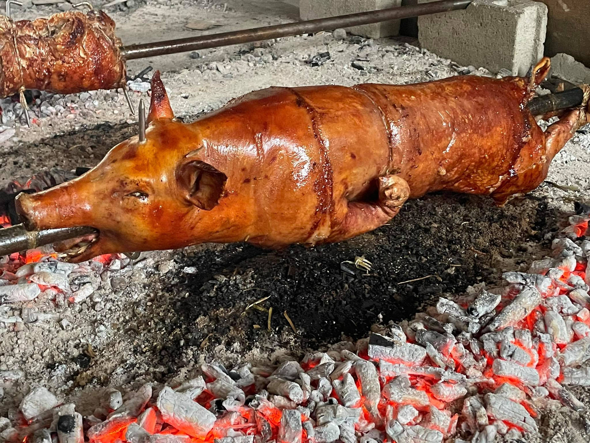 Lechon Getting Roasted Background