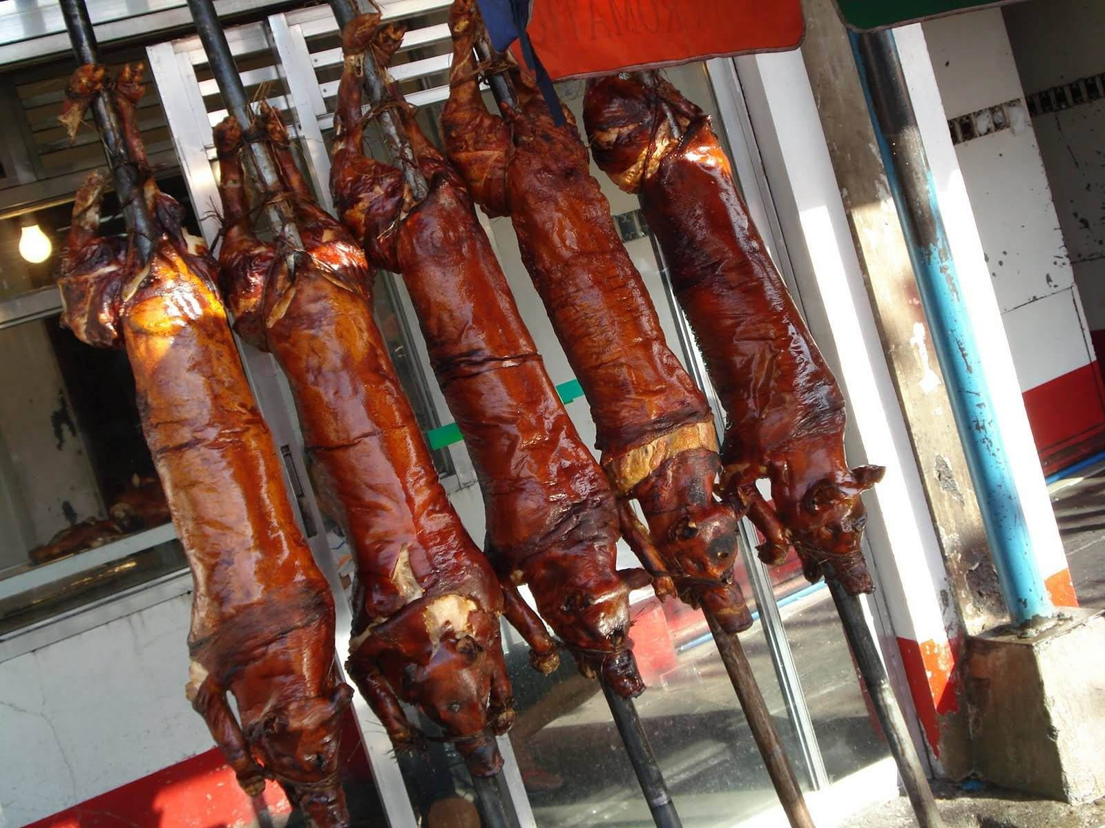 Lechon On Sticks Background