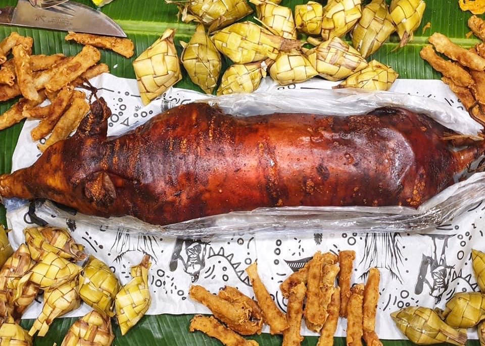 Lechon On Table With Leaves