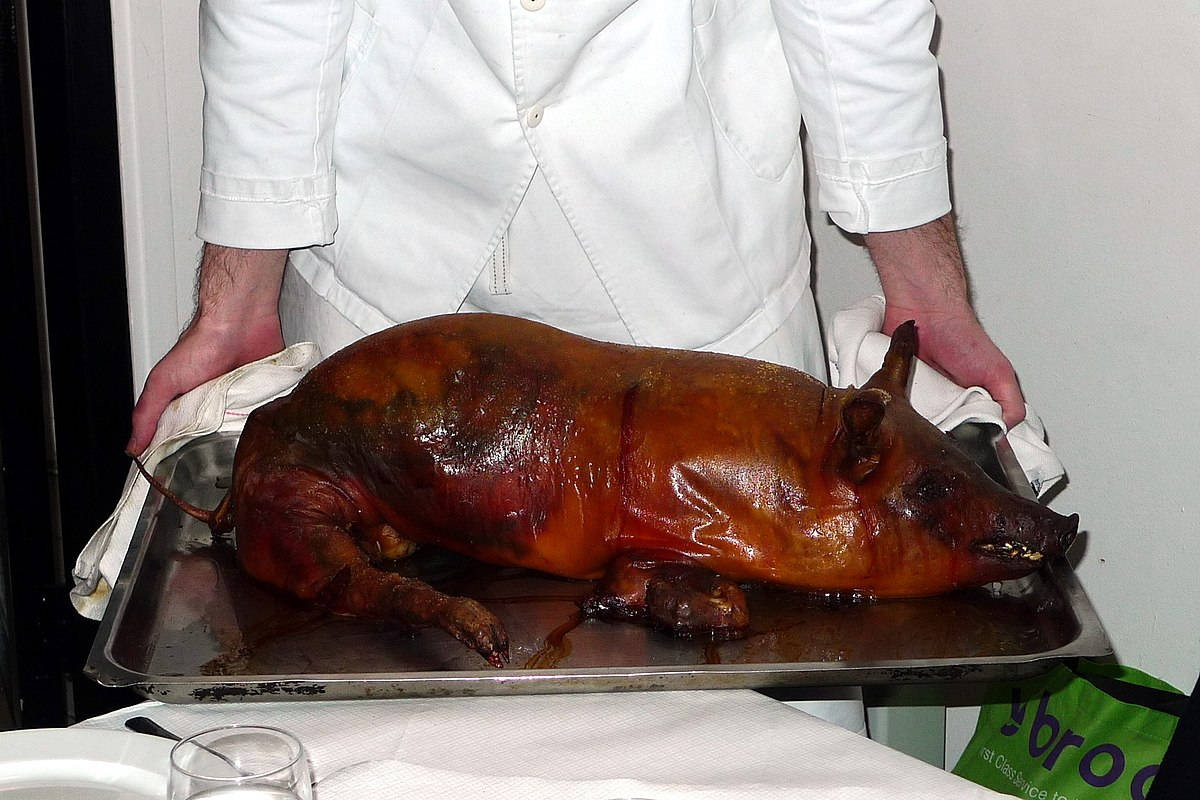 Lechon Served By Chef Background