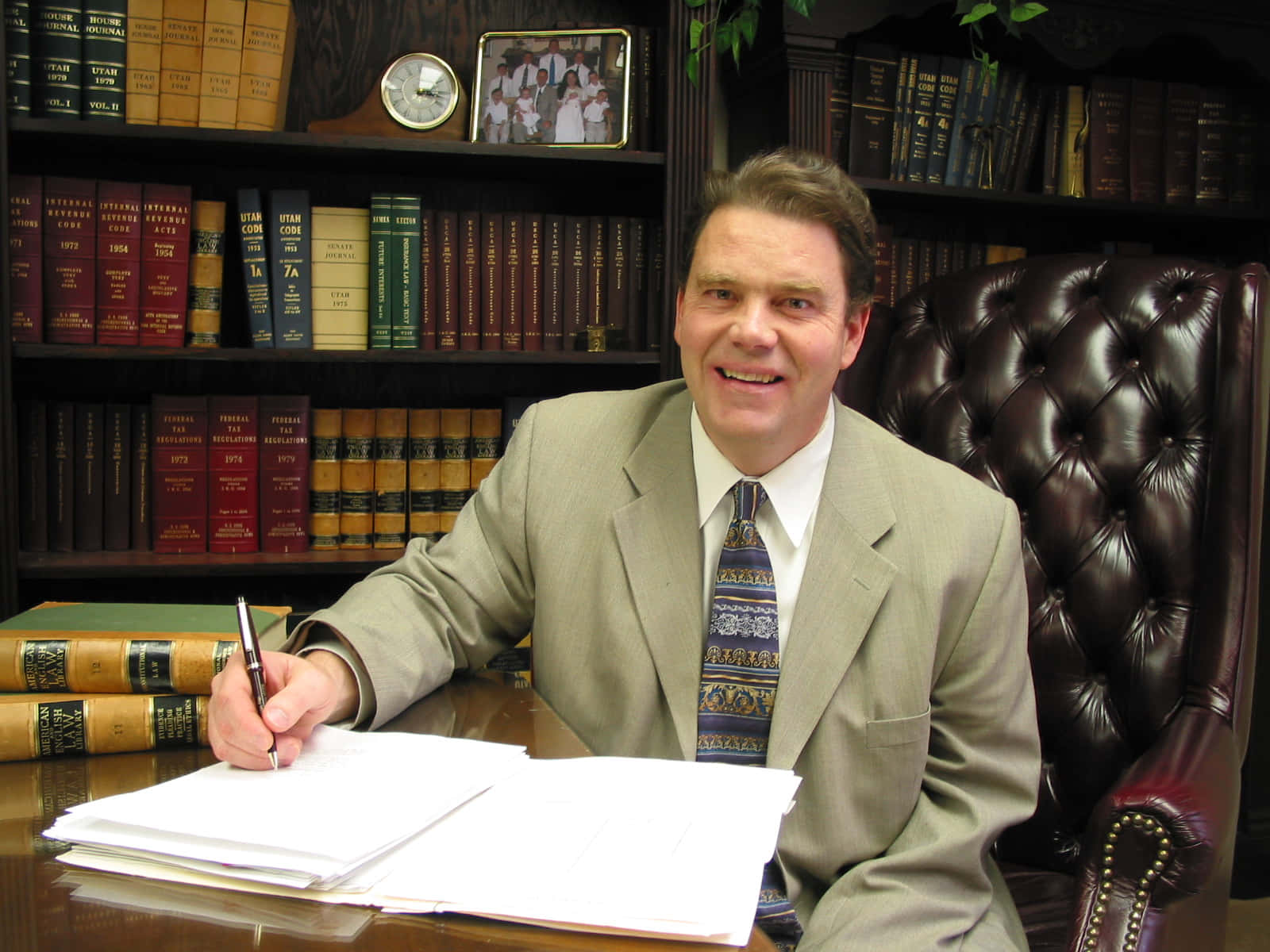 Legal Aid: An Attorney And A Client Discussing Details Of A Case