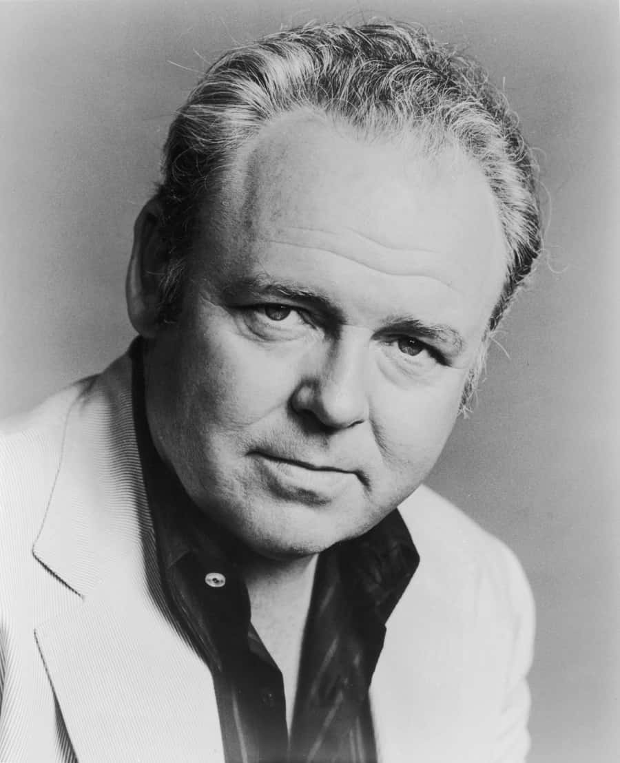 Legendary Actor Carroll O'connor In A Thoughtful Pose Background
