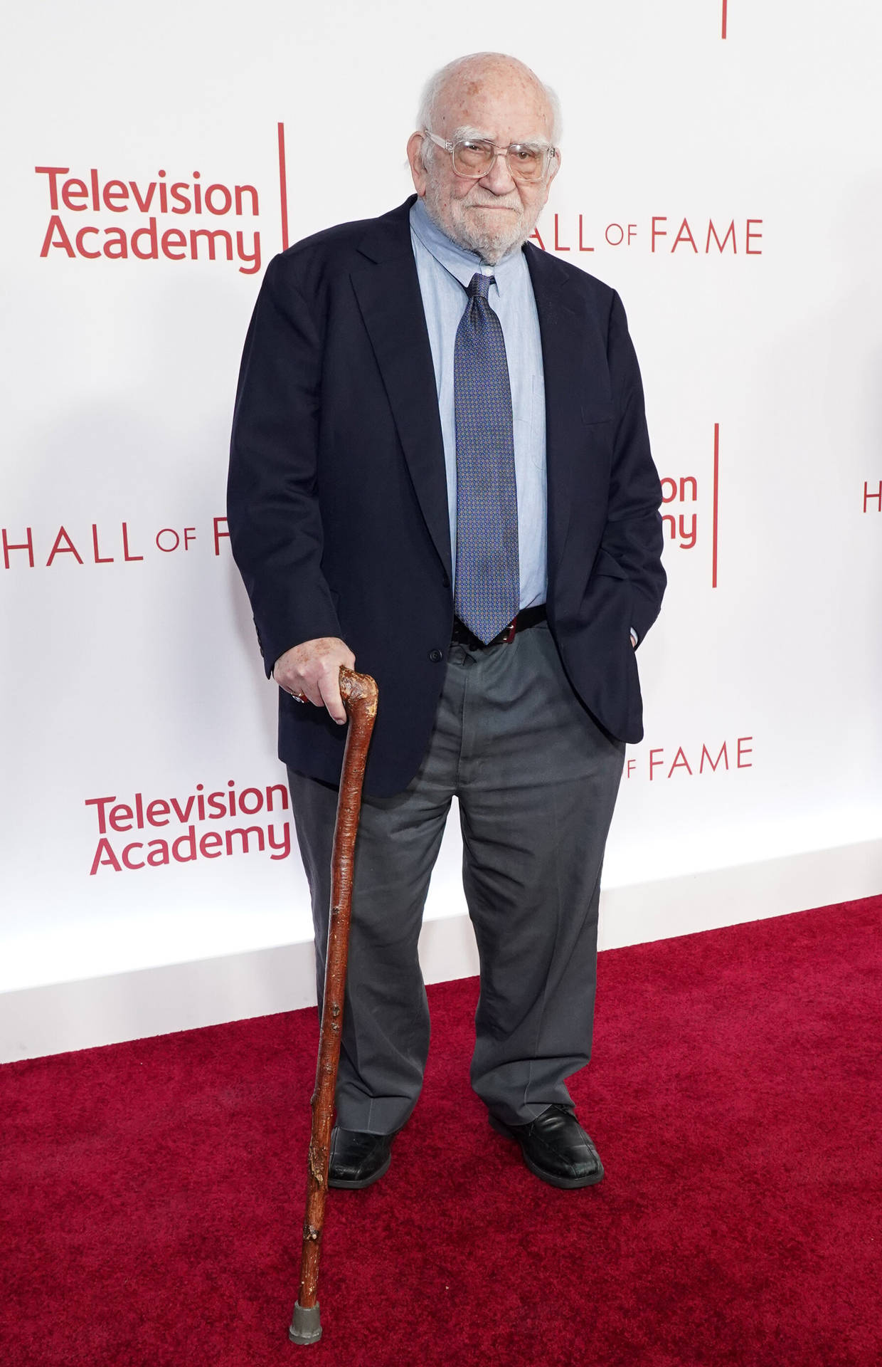 Legendary Actor Edward Asner Gracing The Red Carpet. Background