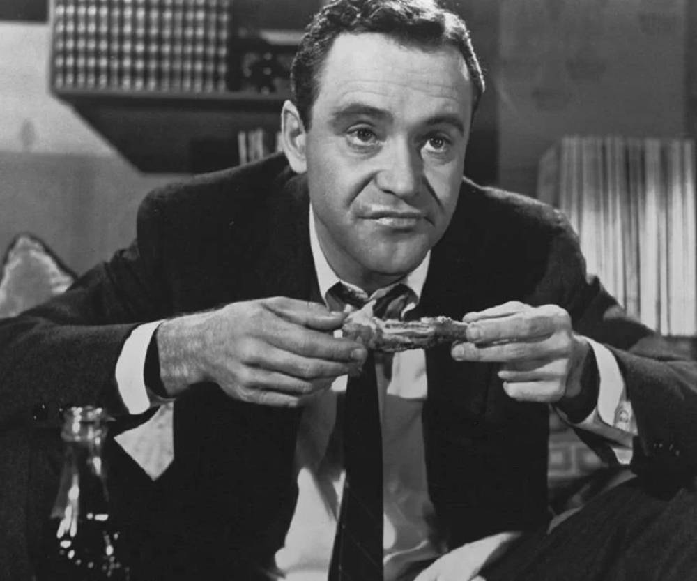 Legendary Actor Jack Lemmon Enjoys His Meal Background