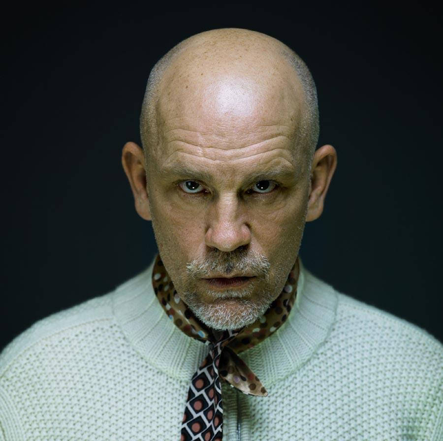 Legendary Actor John Malkovich Posing During A Cinevue Interview Photoshoot. Background