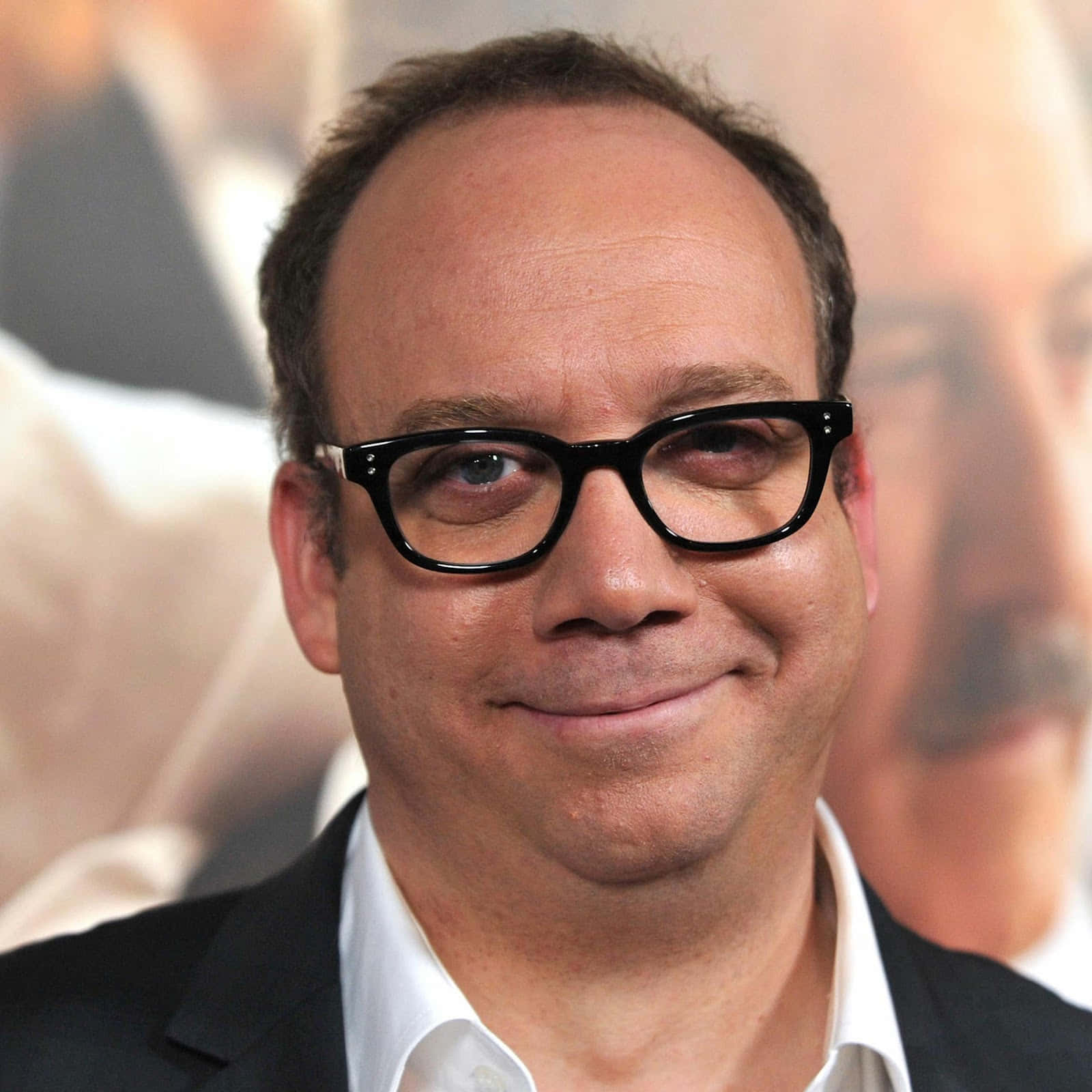 Legendary Actor Paul Giamatti Captivating Headshot Background