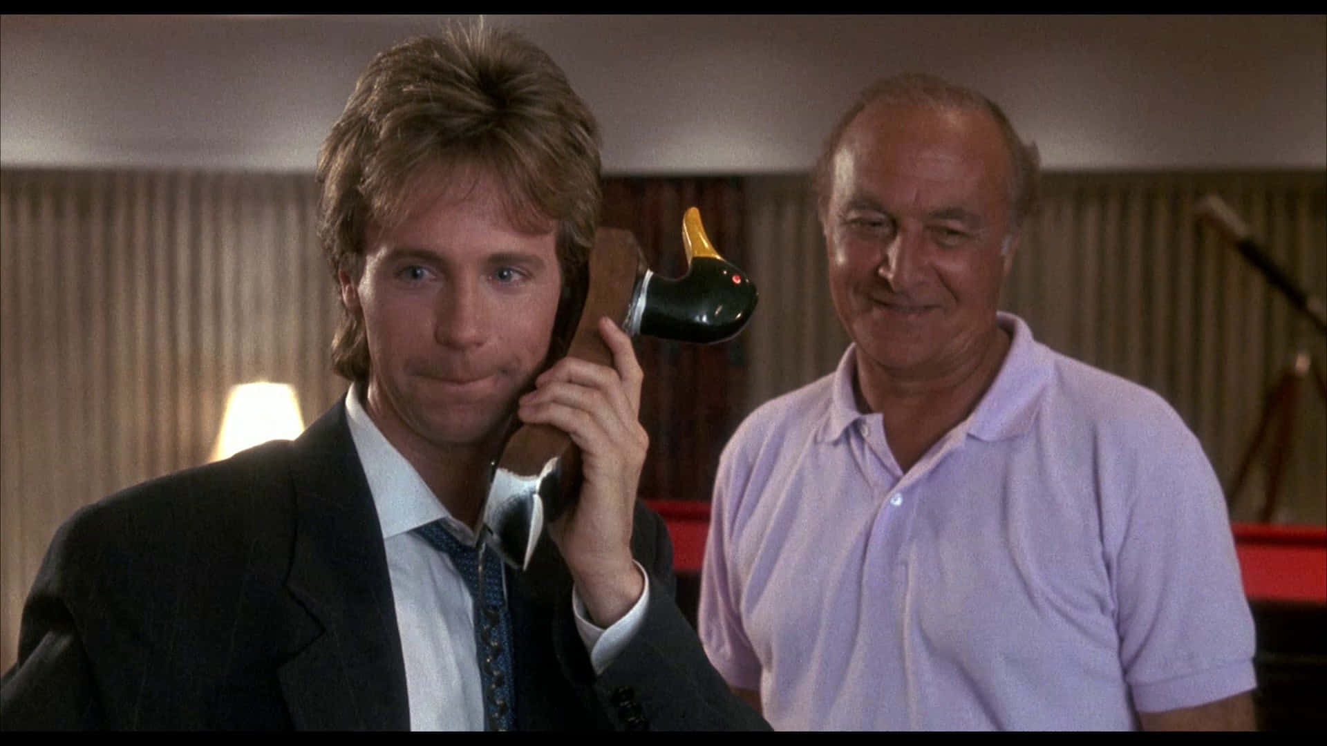 Legendary Actor Robert Loggia With Comedian Dana Carvey Background