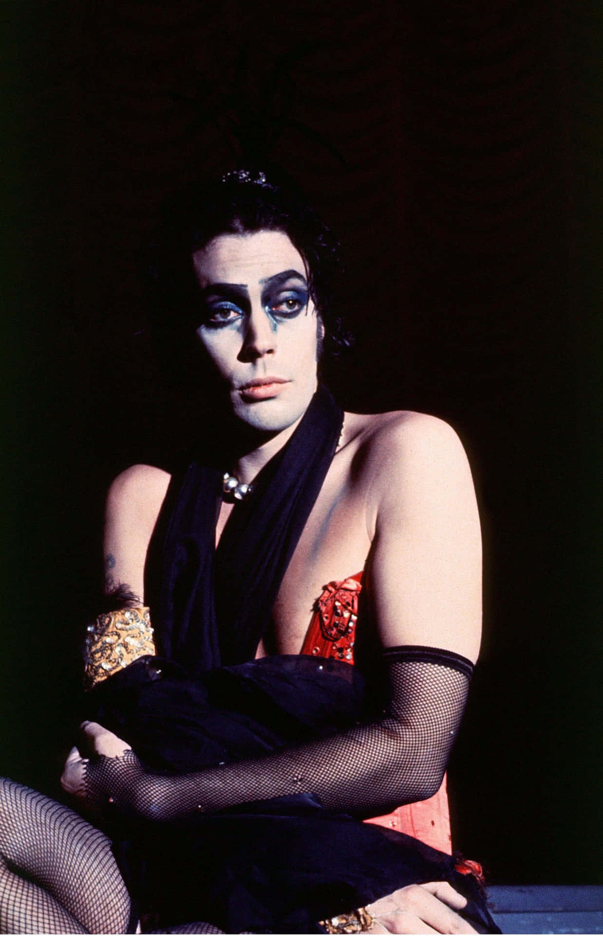 Legendary Actor Tim Curry In An Iconic Pose. Background