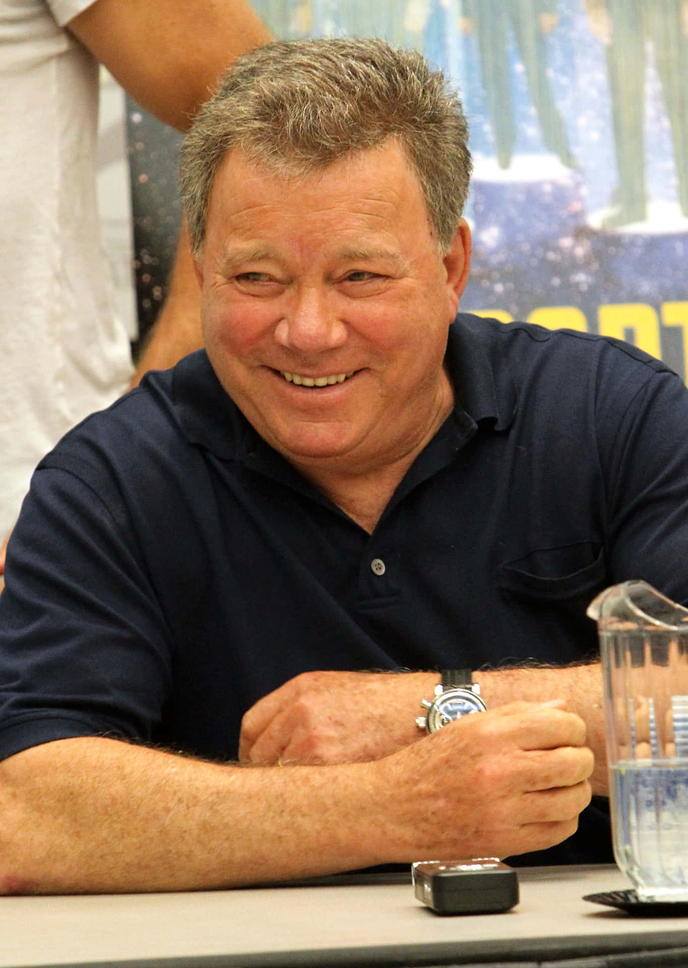 Legendary Actor William Shatner In A Candid Portrait Background