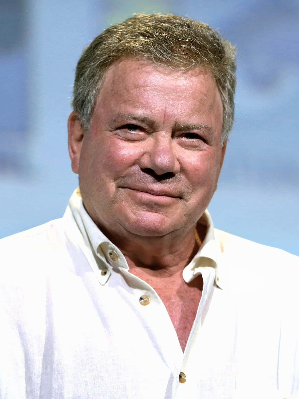 Legendary Actor William Shatner In A Contemplative Pose Background