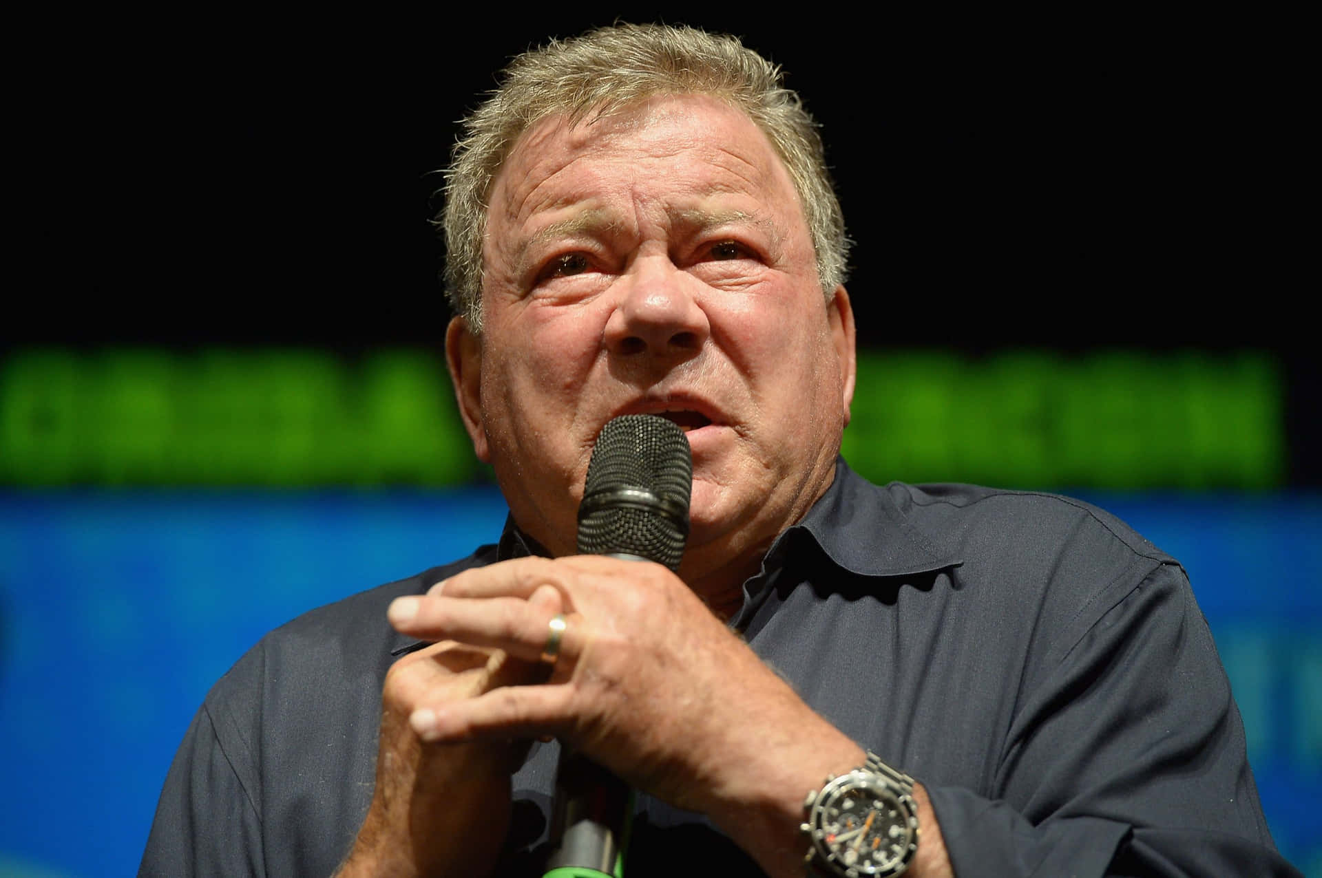 Legendary Actor William Shatner Smiling Background