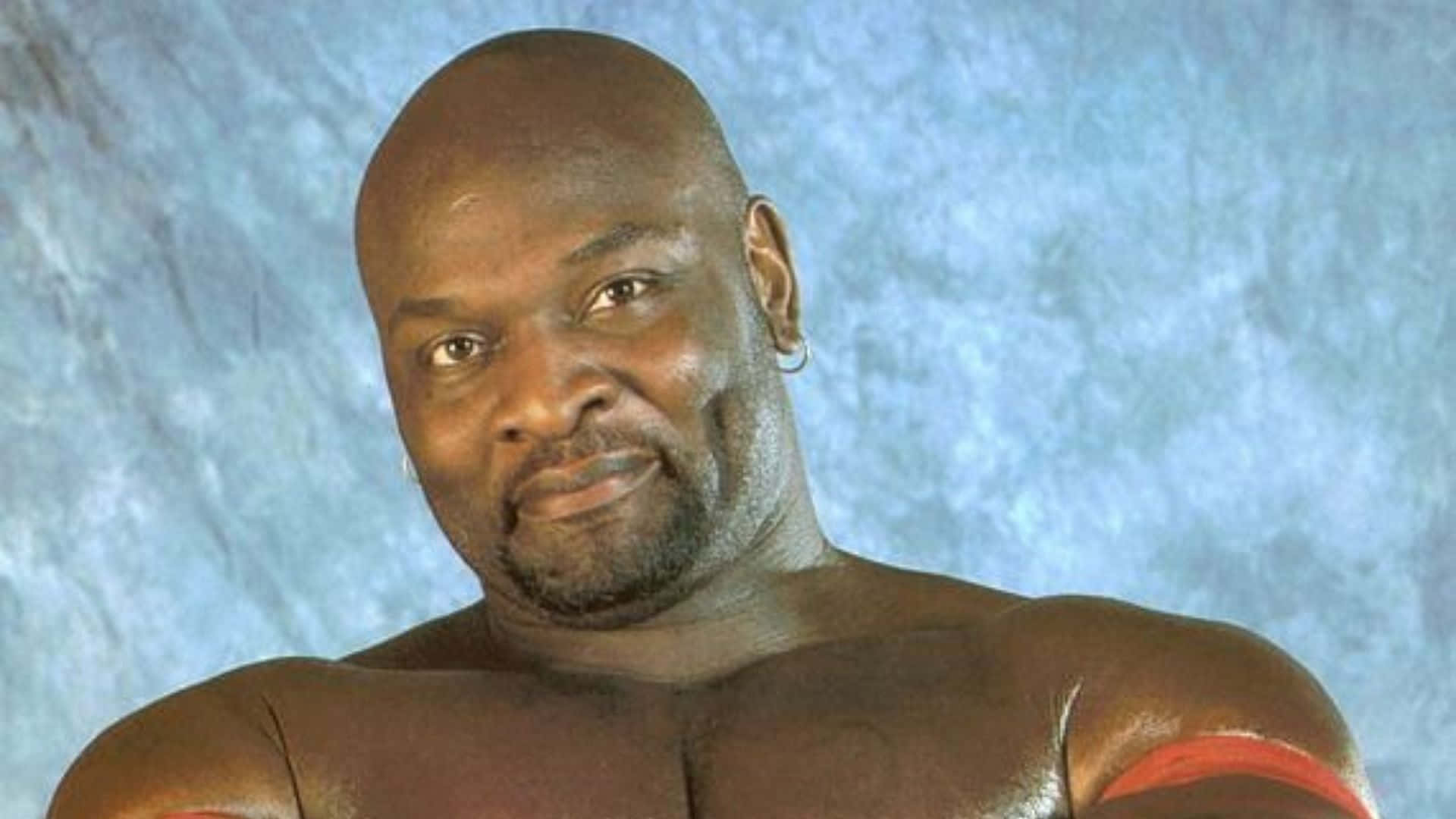Legendary Ahmed Johnson In Wrestling Action Background