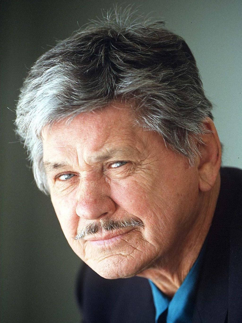 Legendary American Actor Charles Bronson In His Latter Years Background