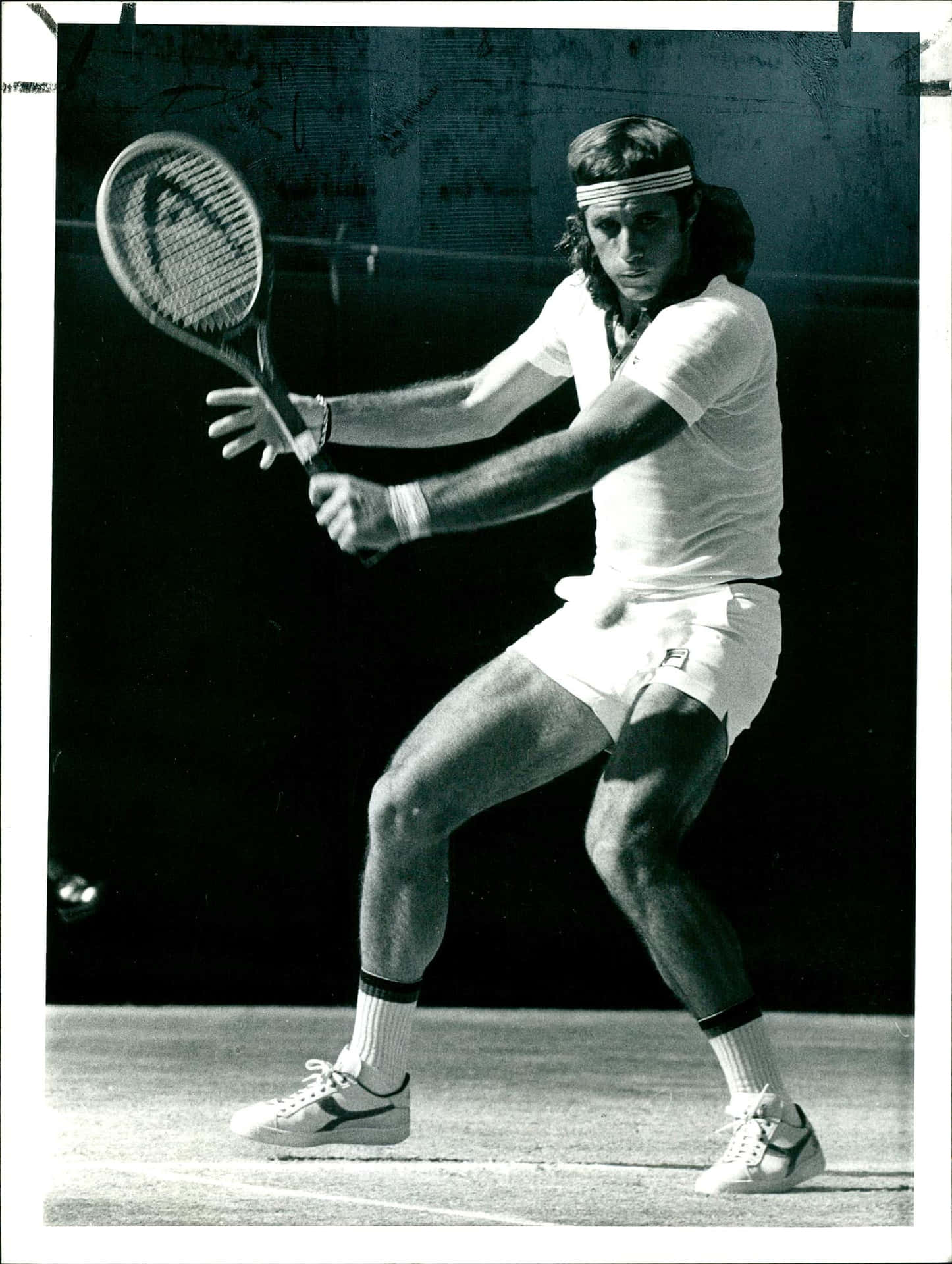 Legendary Argentine Tennis Star Guillermo Vilas In Action Background