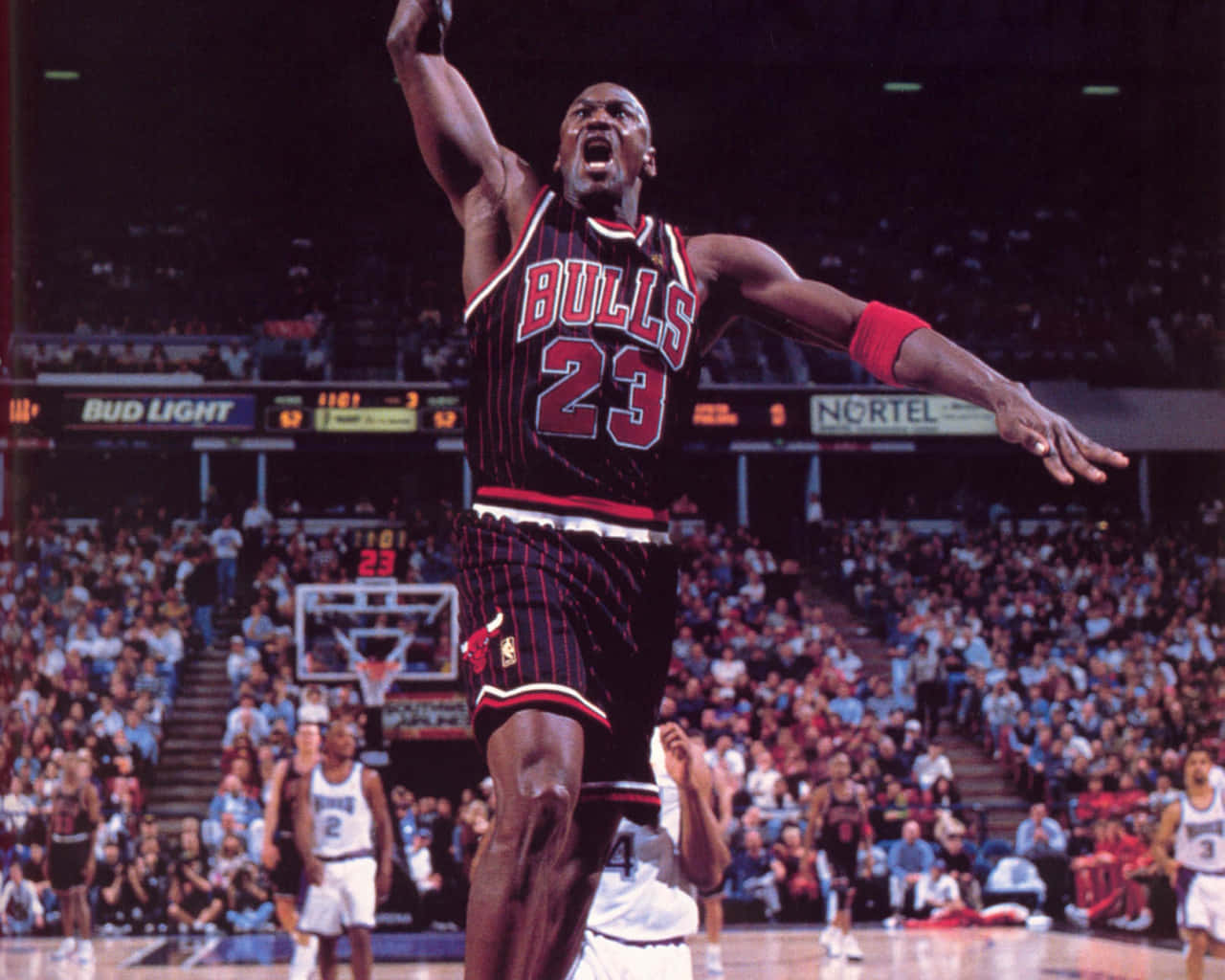 Legendary Basketball Player Michael Jordan In His Iconic Bulls Jersey Background