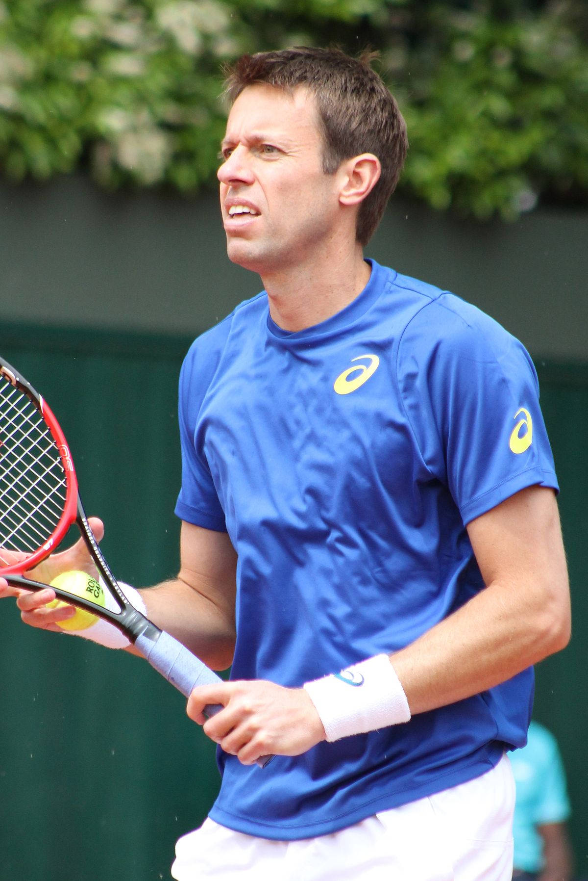 Legendary Canadian Tennis Player, Daniel Nestor, Intensely Focused On The Court Background