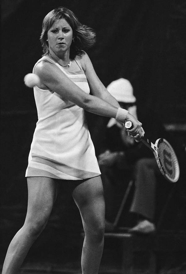 Legendary Chris Evert In Action On Court Background