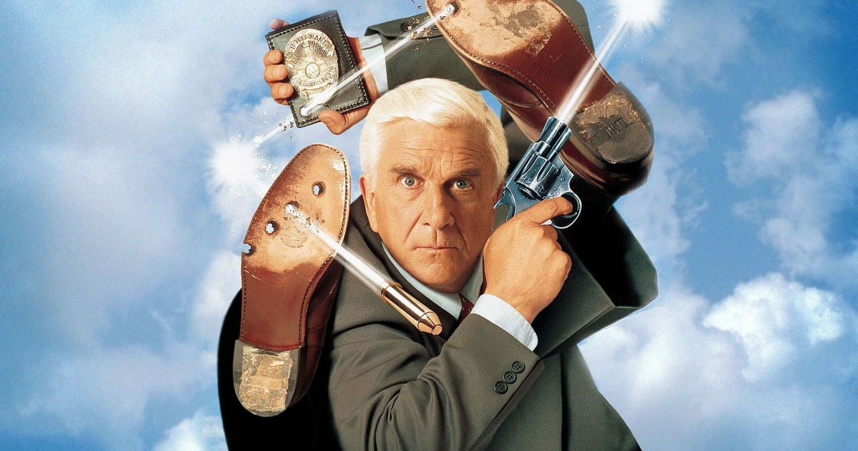Legendary Comedian Leslie Nielsen In A Candid Pose. Background