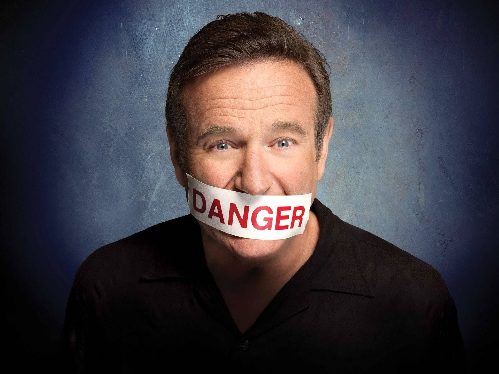 Legendary Comedian Robin Williams In Creative Expression Background