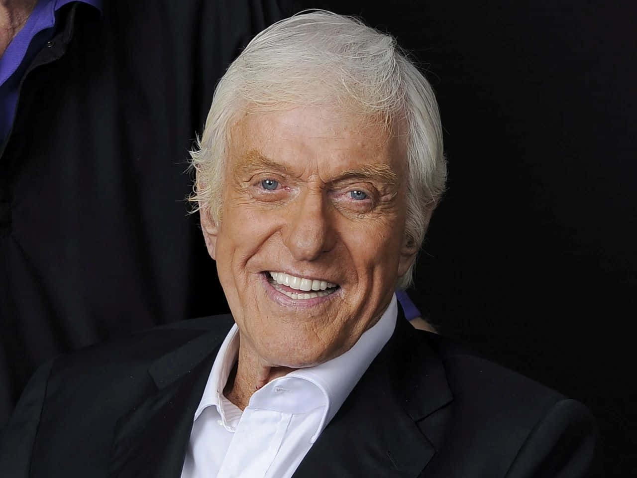 Legendary Entertainer Smiling Portrait Background