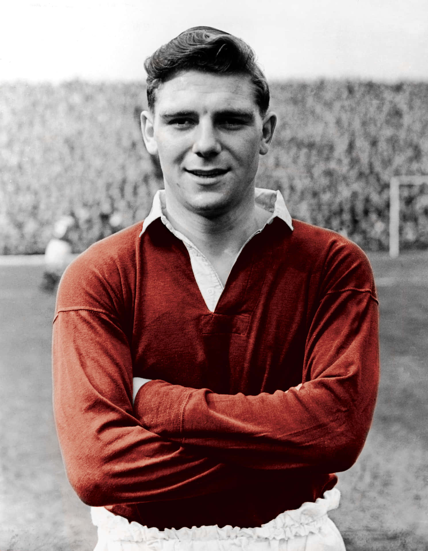 Legendary Football Player Duncan Edwards In Red Background
