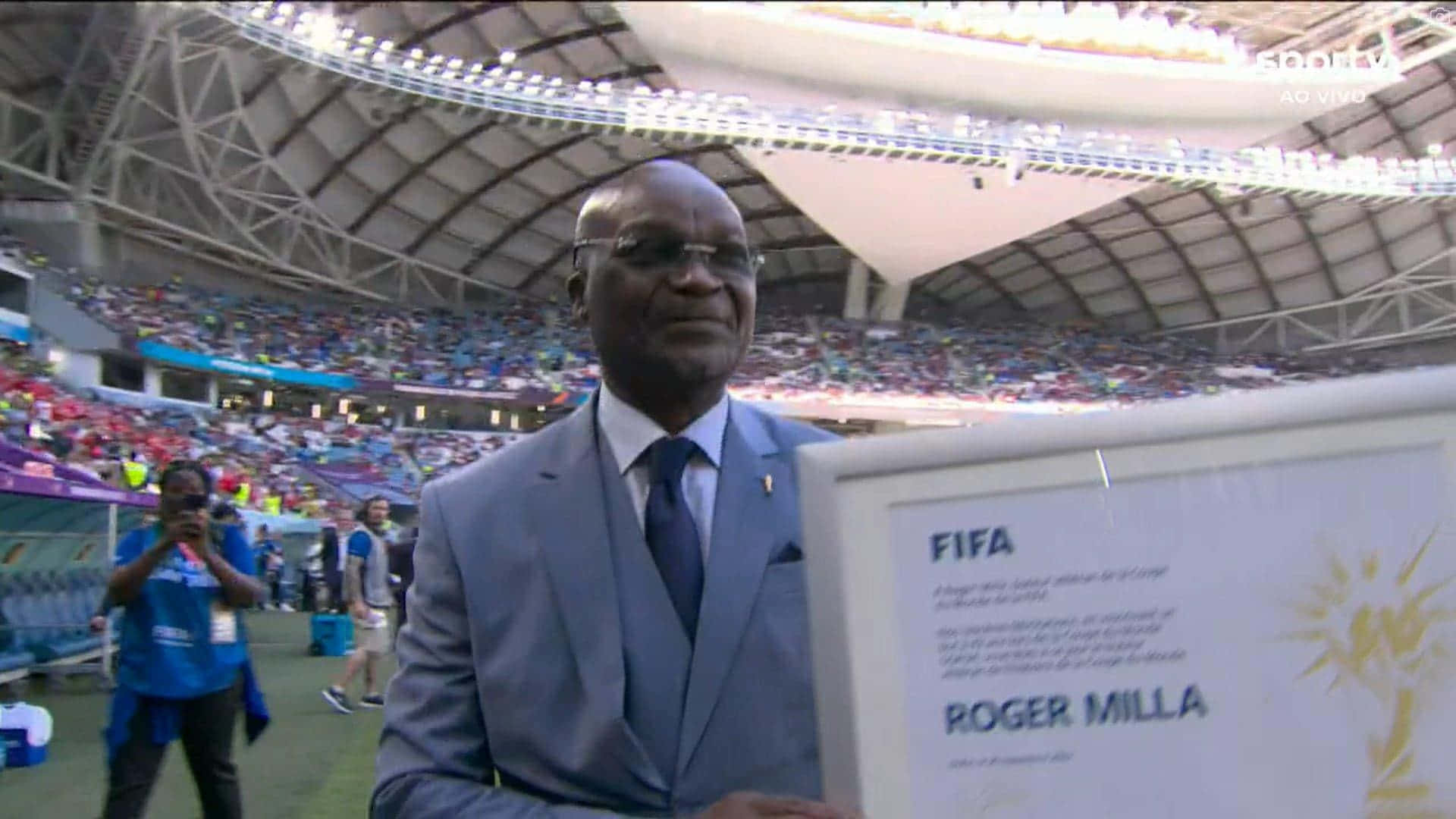 Legendary Footballer Roger Milla In Action Background