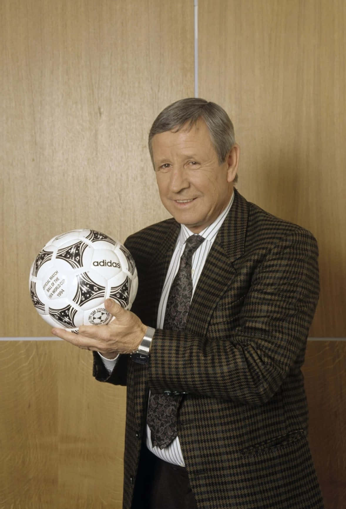 Legendary Footballerwith Adidas Ball Background