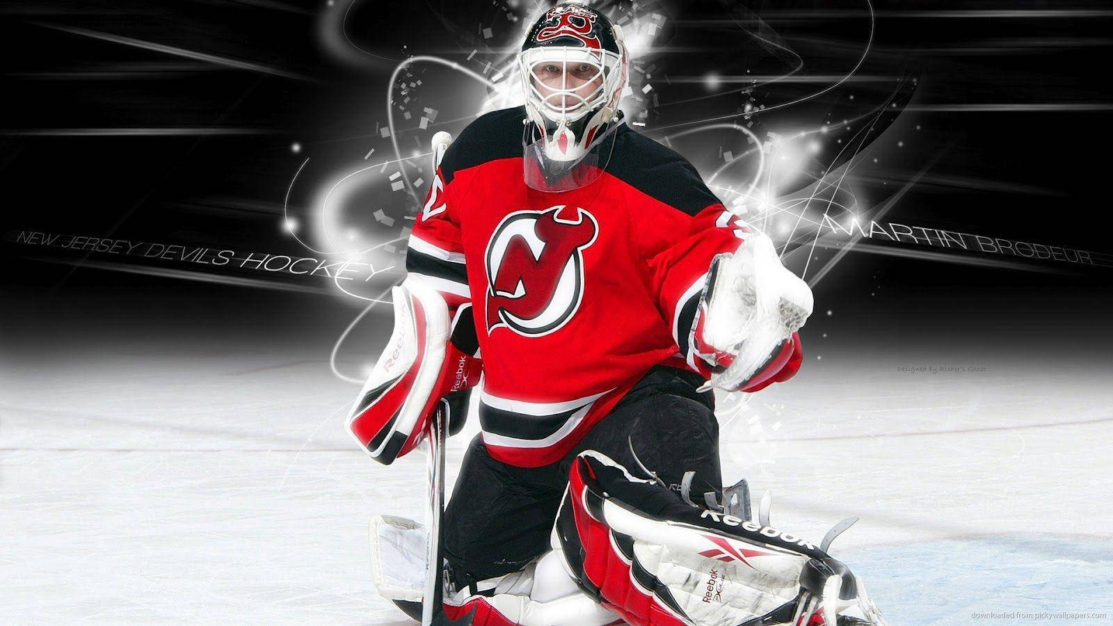 Legendary Goalkeeper Martin Brodeur Of The New Jersey Devils In Action Background