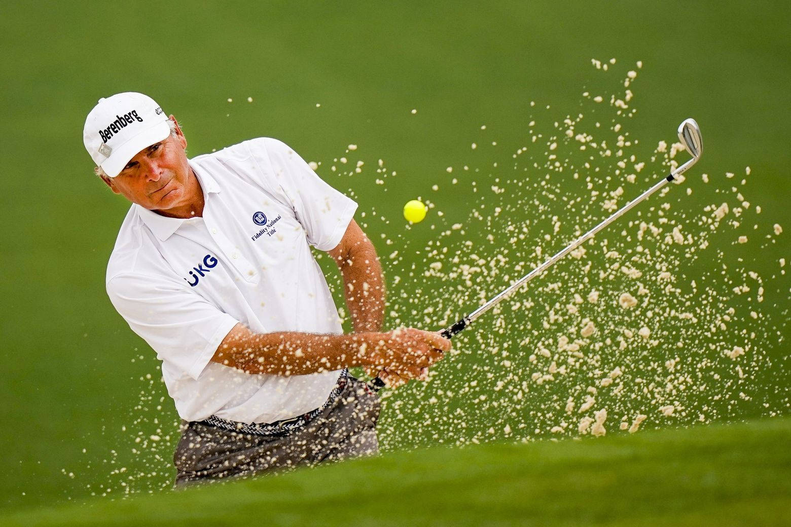 Legendary Golfer Fred Couples At Full Swing Background