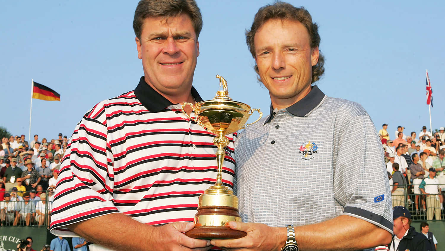 Legendary Golfers Hal Sutton And Bernhard Langer On The Golf Course Background