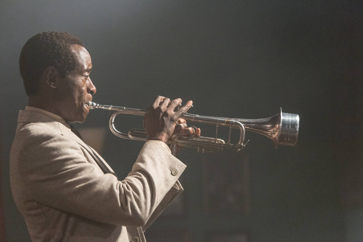 Legendary Jazz Artist Miles Davis With His Trumpet Background