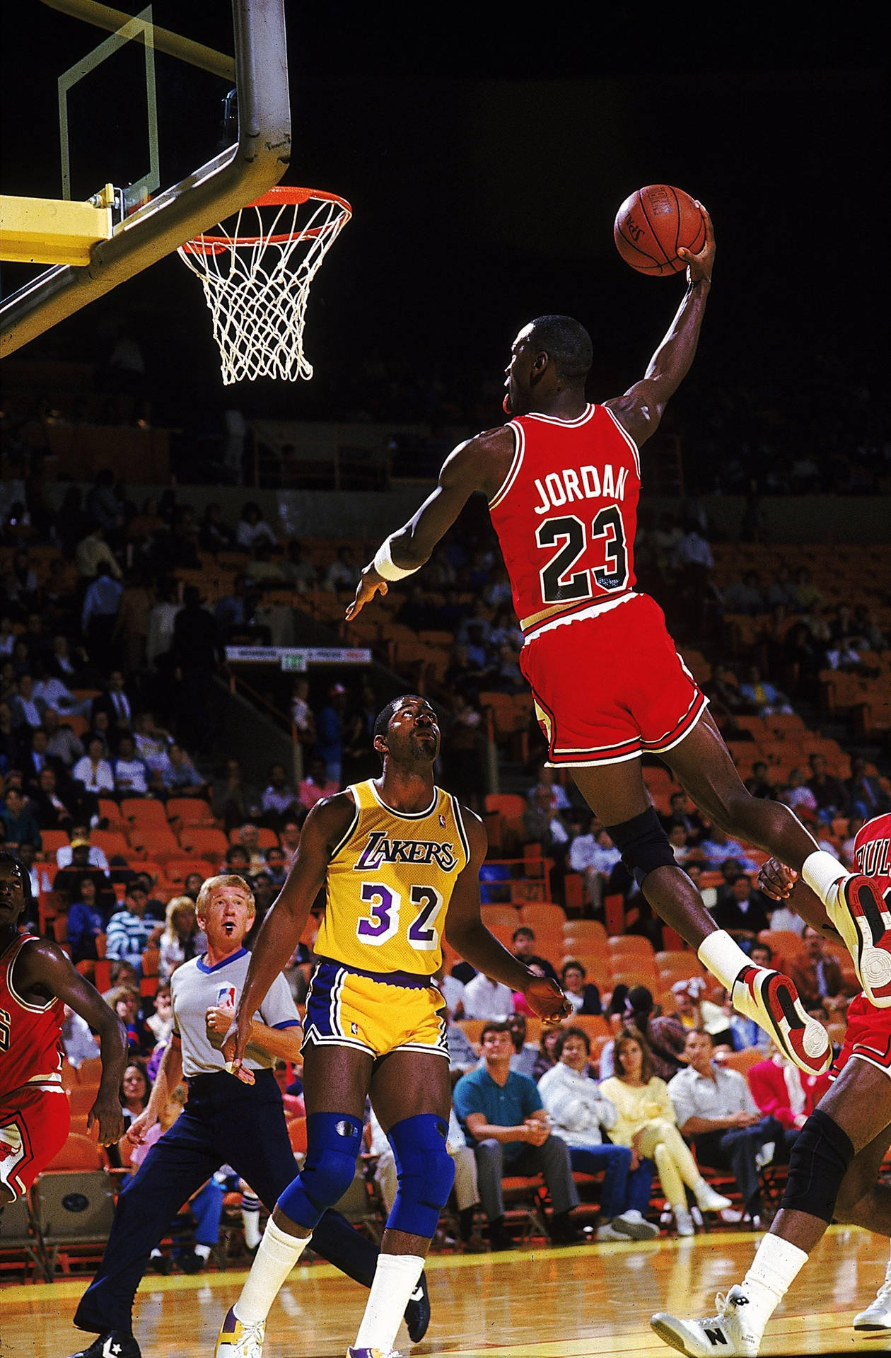 Legendary Michael Jordan Showcases His Iconic Slam Dunk Background