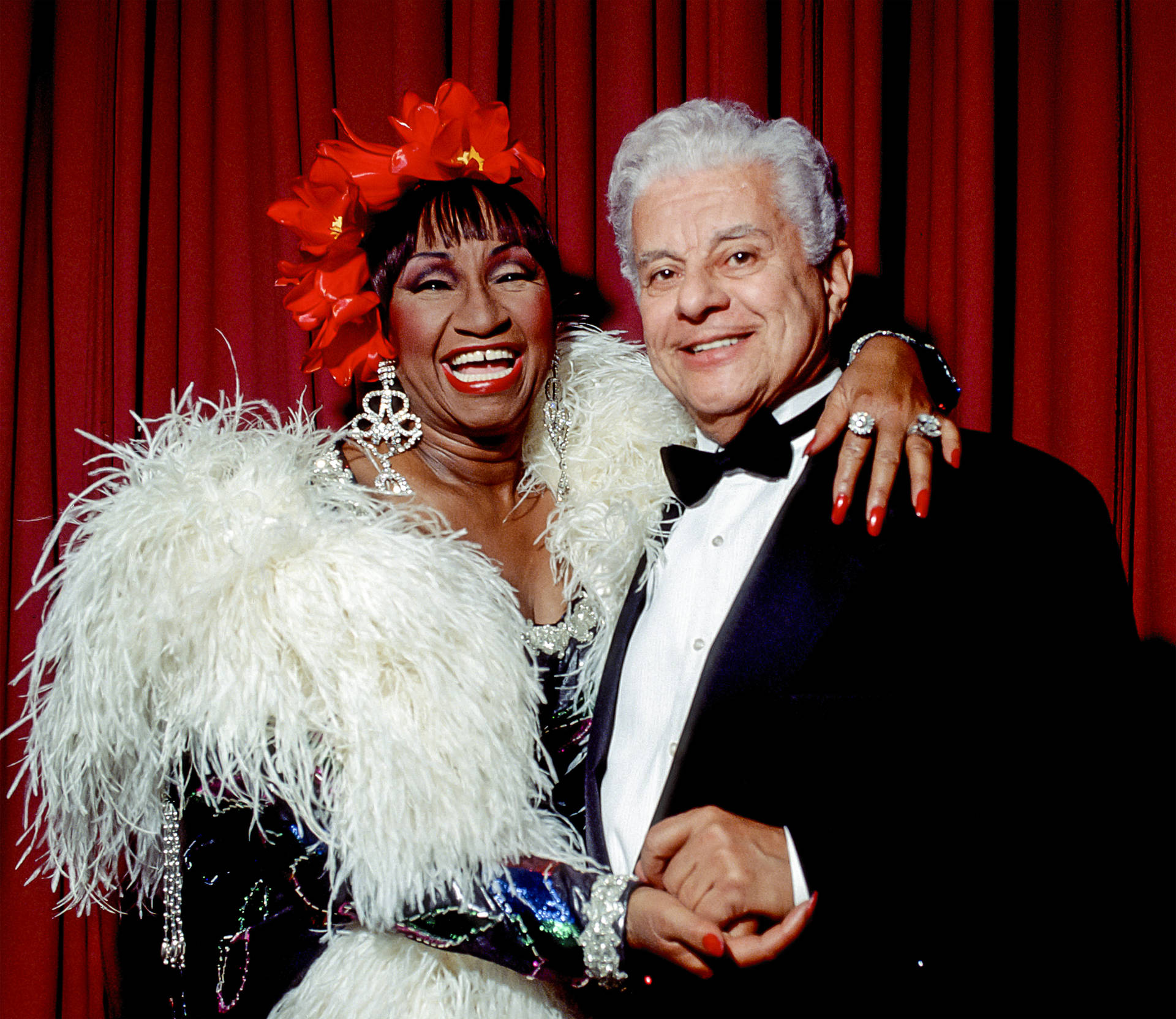 Legendary Musicians Tito Puente And Celia Cruz In Concert Background