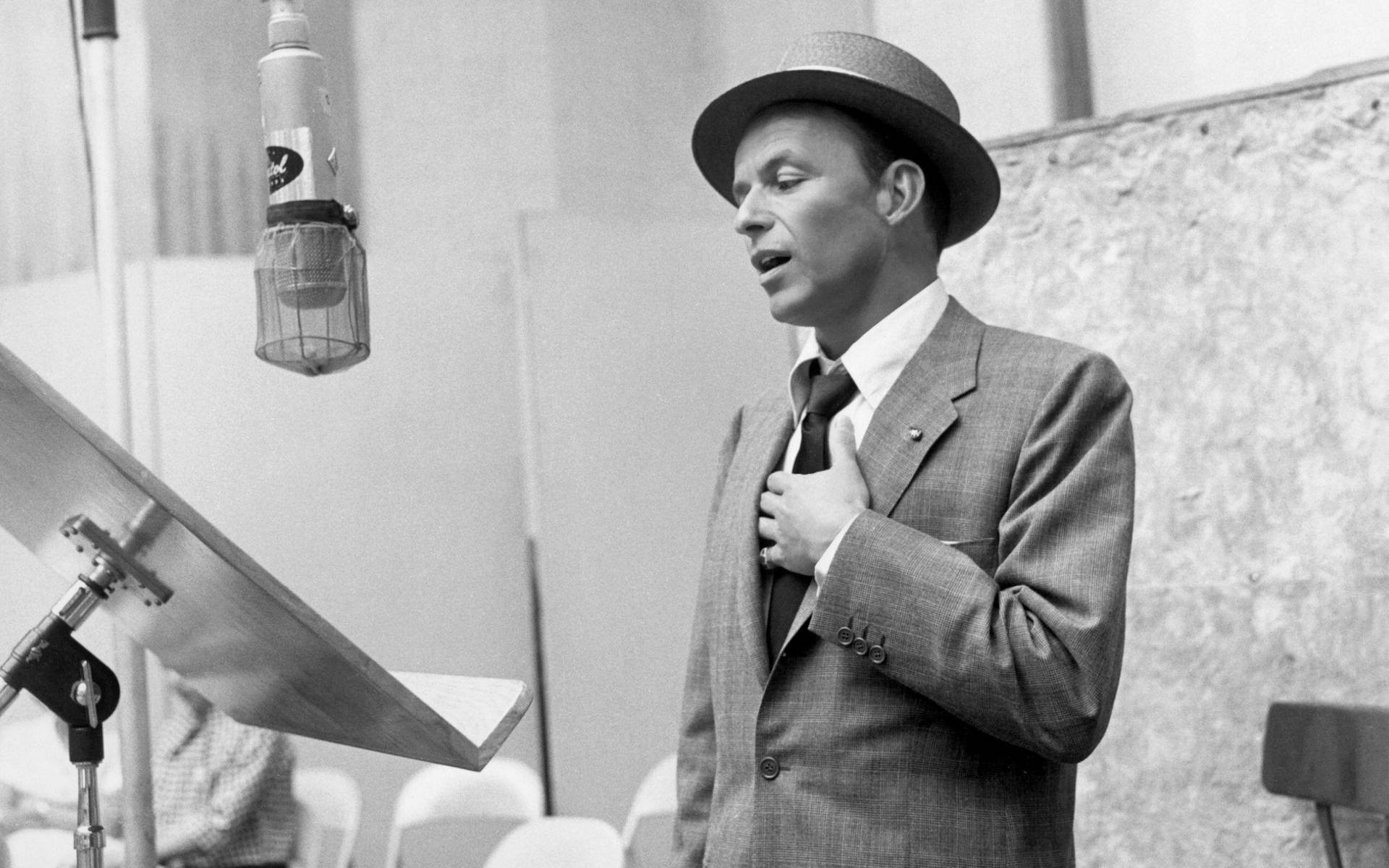 Legendary Singer Frank Sinatra In His Element Background