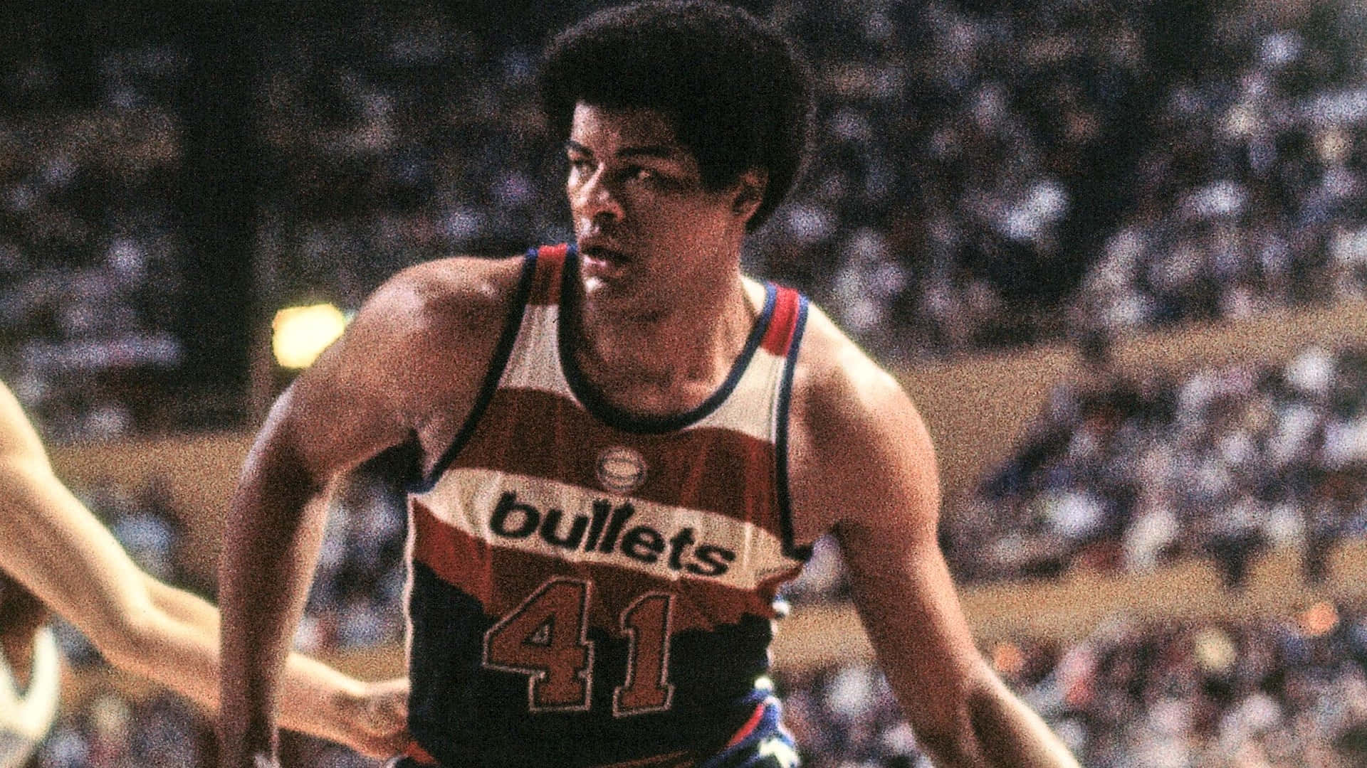 Legendary Washington Bullets Player Wes Unseld In Action Background