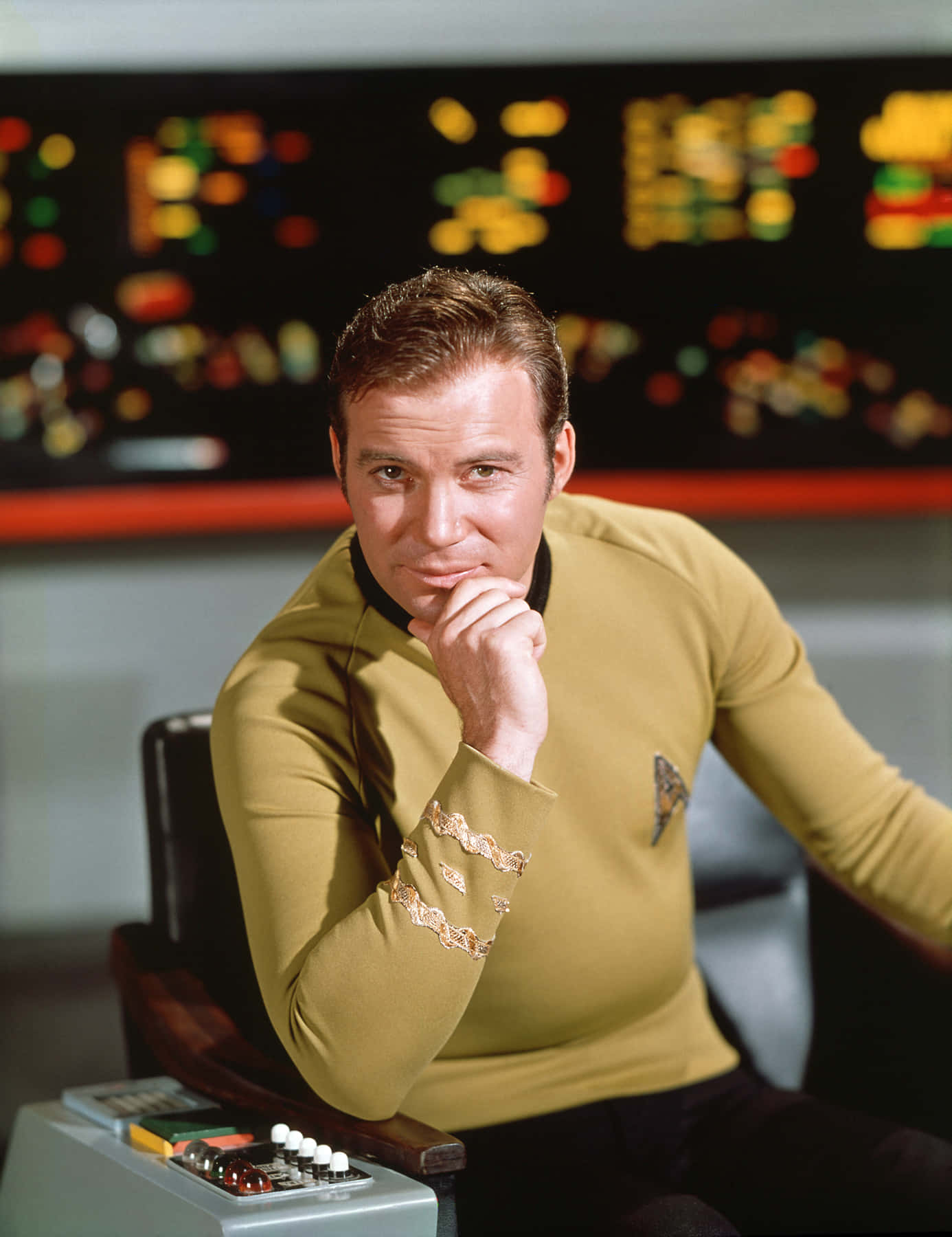 Legendary William Shatner Exuding Sophistication And Timeless Charm Background