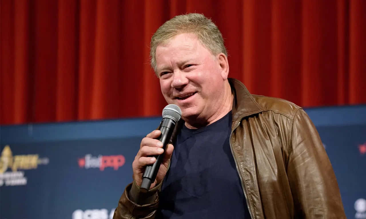 Legendary William Shatner Striking A Pose Background