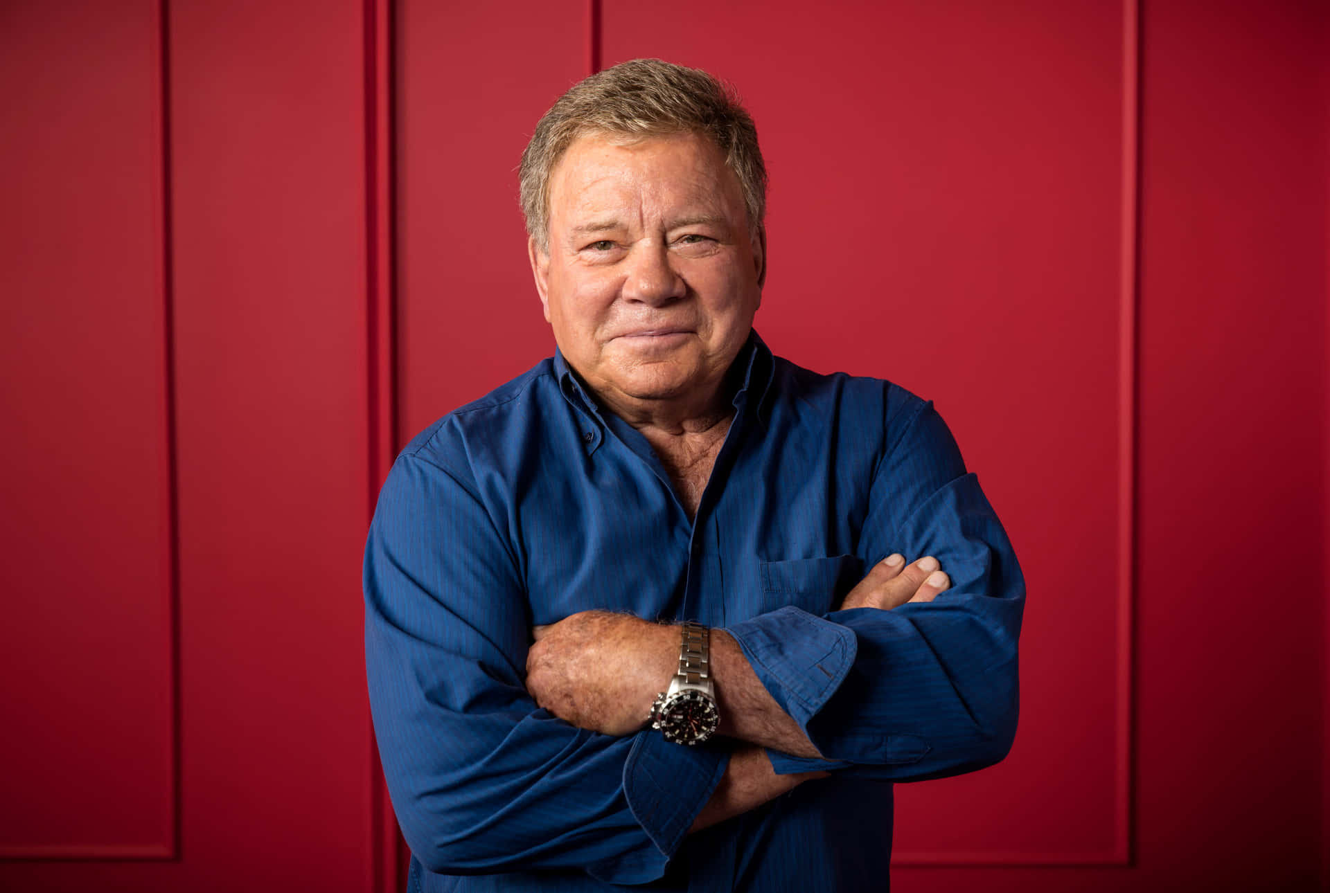 Legendary William Shatner Striking A Pose Background