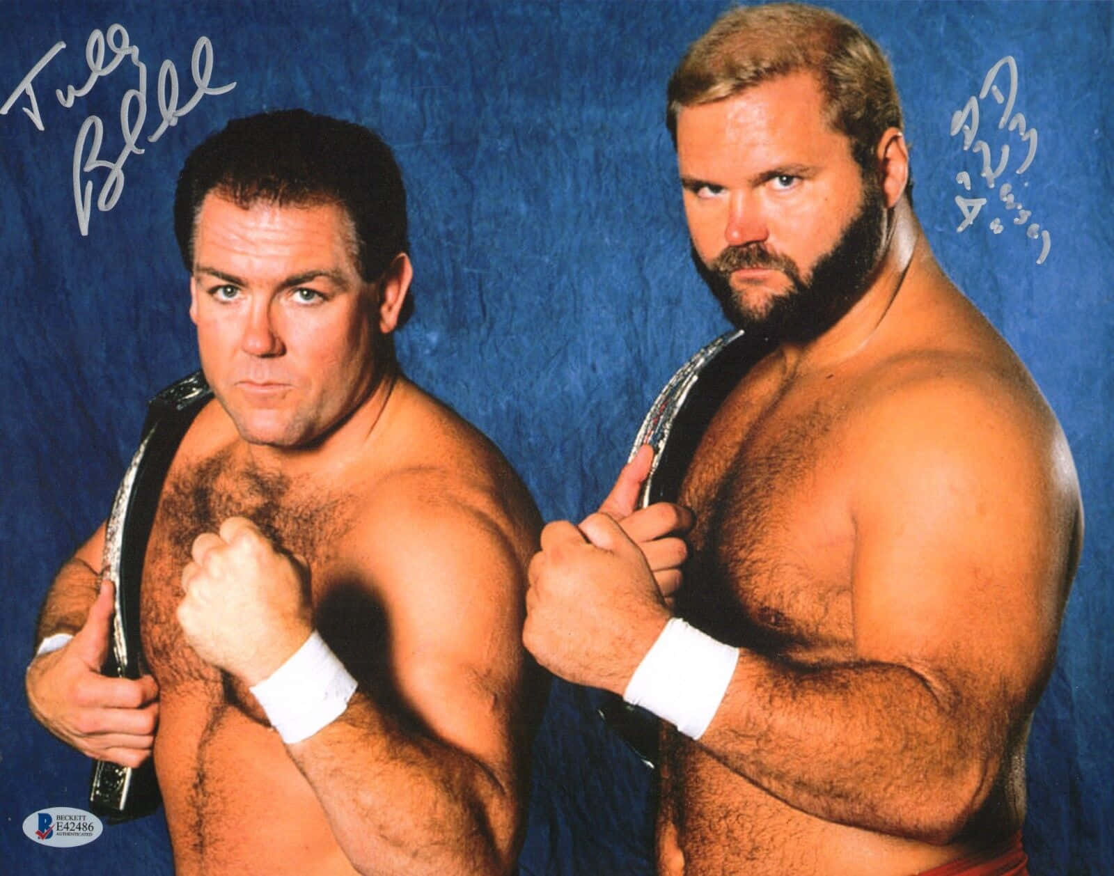Legendary Wrestler, Arn Anderson, And Tully Blanchard Posing During An Autograph Signing Session. Background