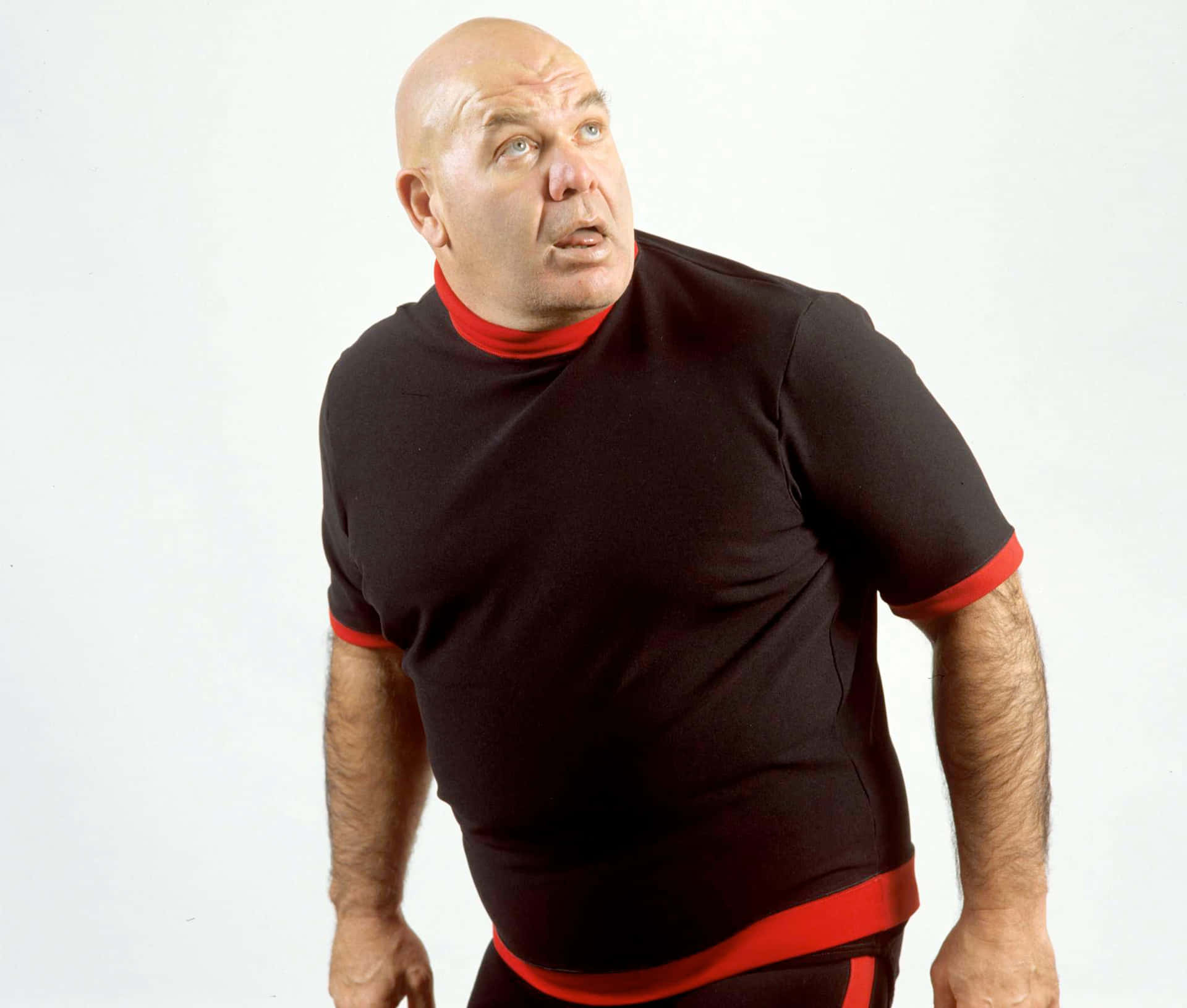 Legendary Wrestler George Steele In Classic Pose Background