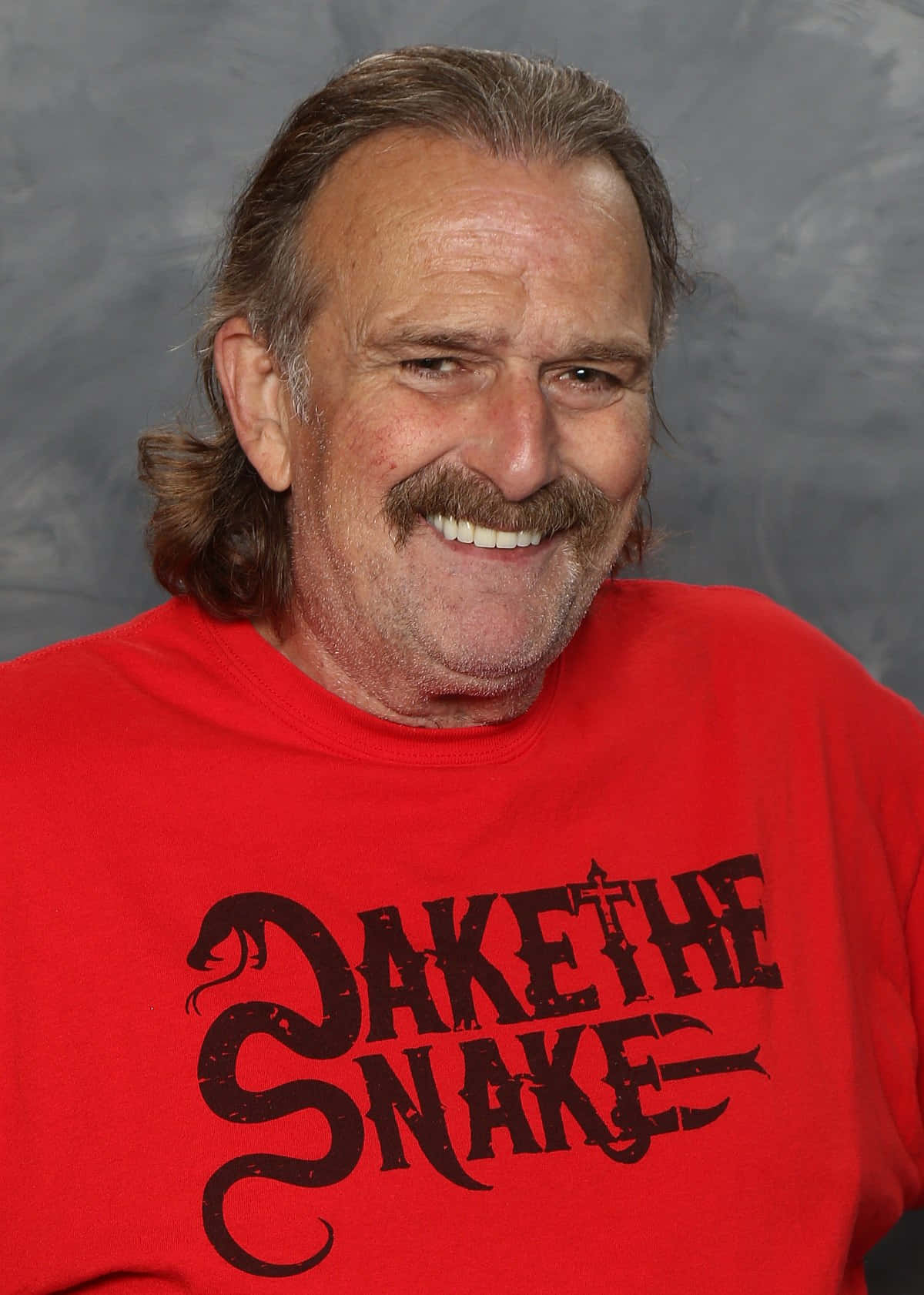 Legendary Wrestler Jake Roberts At Super Retrocon 2017 Background