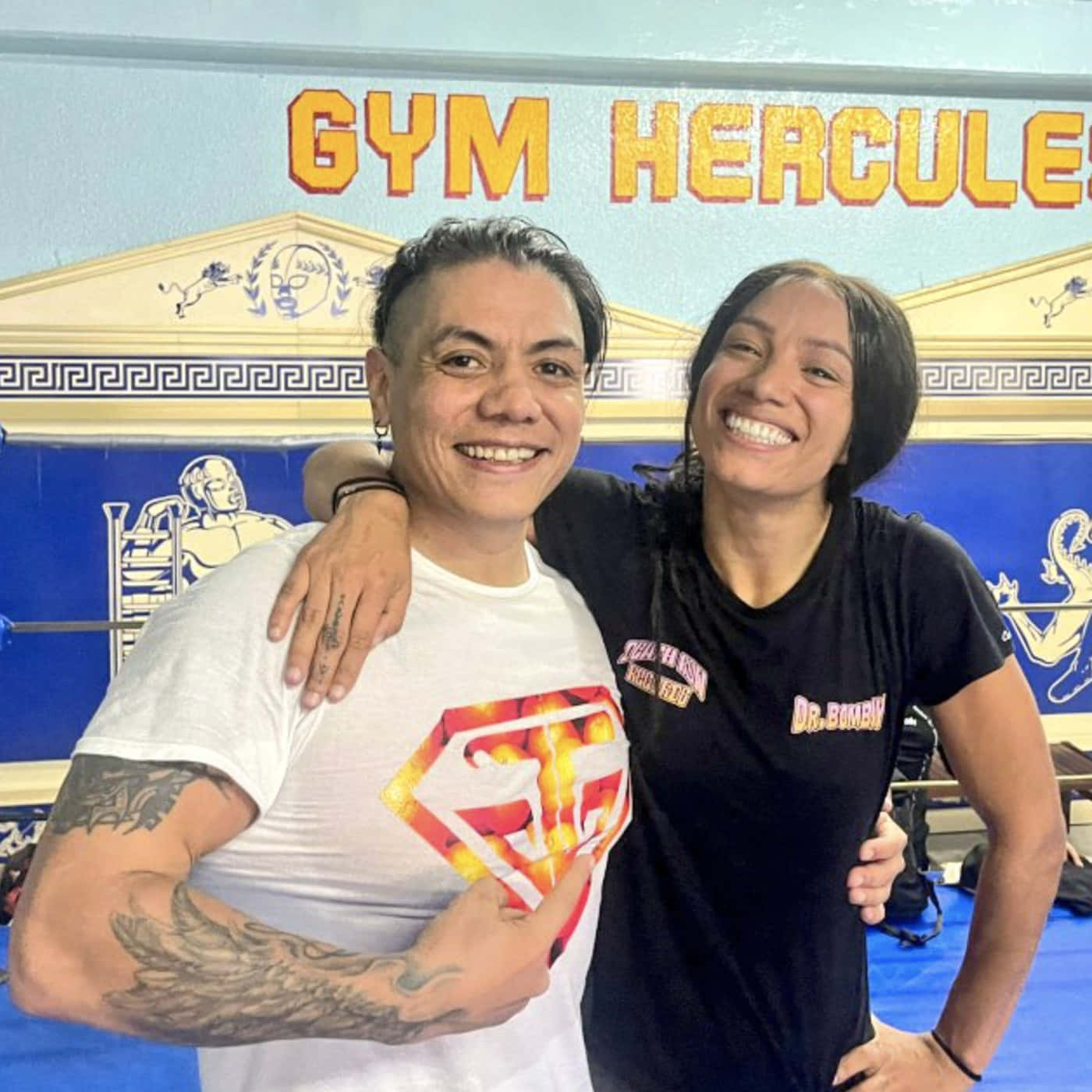 Legendary Wrestler Juventud Guerrera Posing With Wrestling Superstar Sasha Banks Background