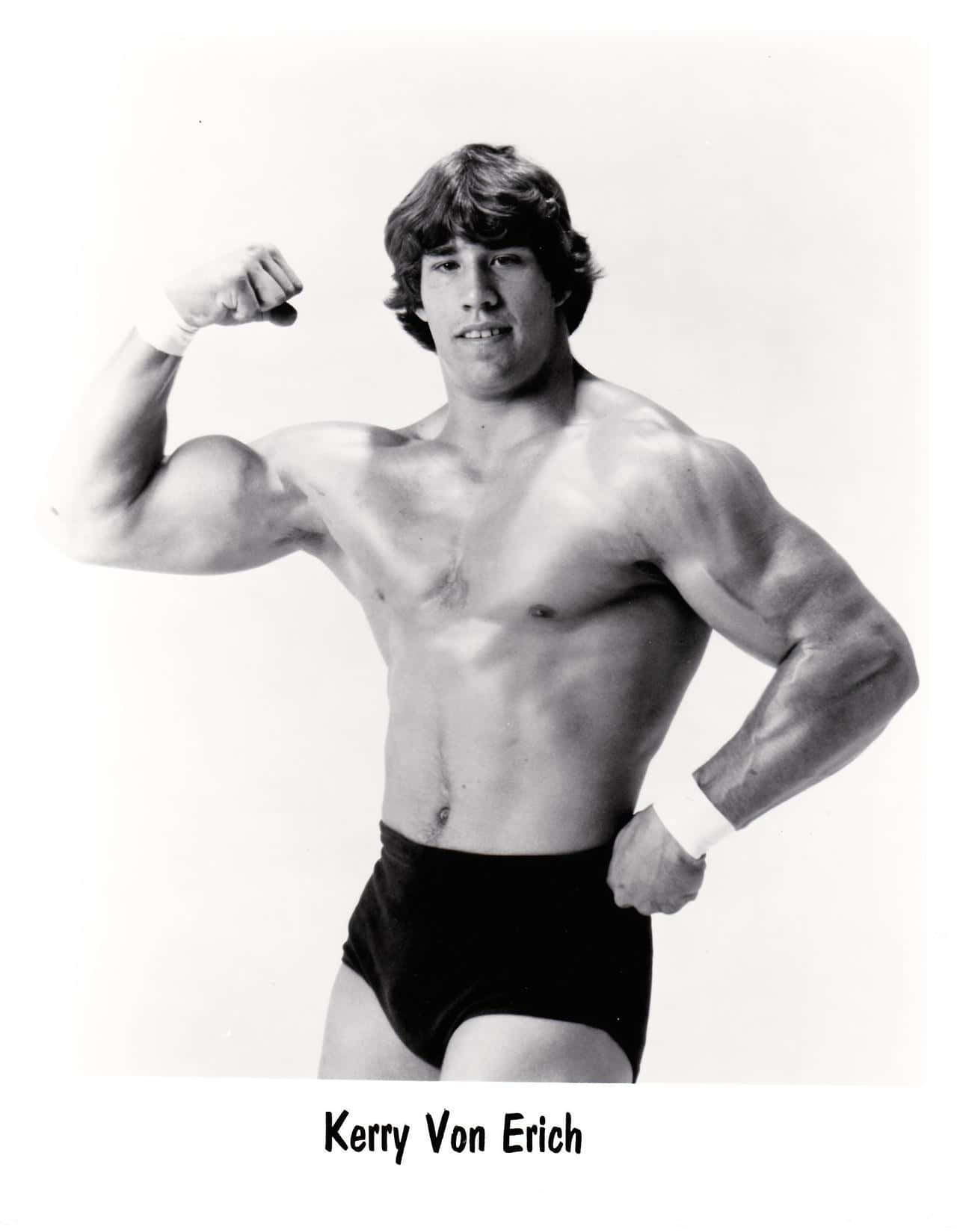 Legendary Wrestler Kerry Von Erich Showcasing His Strength Background
