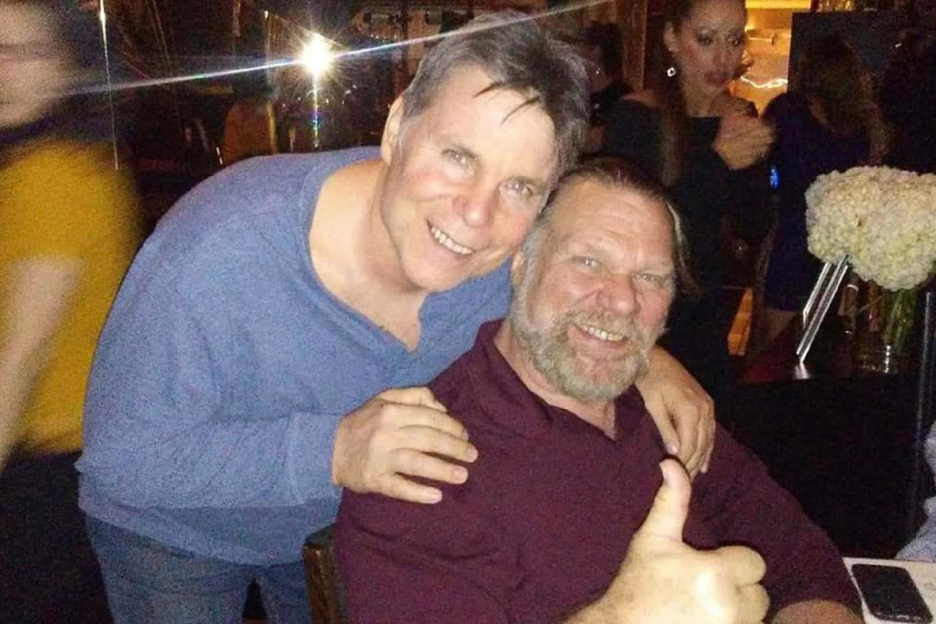 Legendary Wrestlers Jim Duggan And Lanny Poffo In Action Background